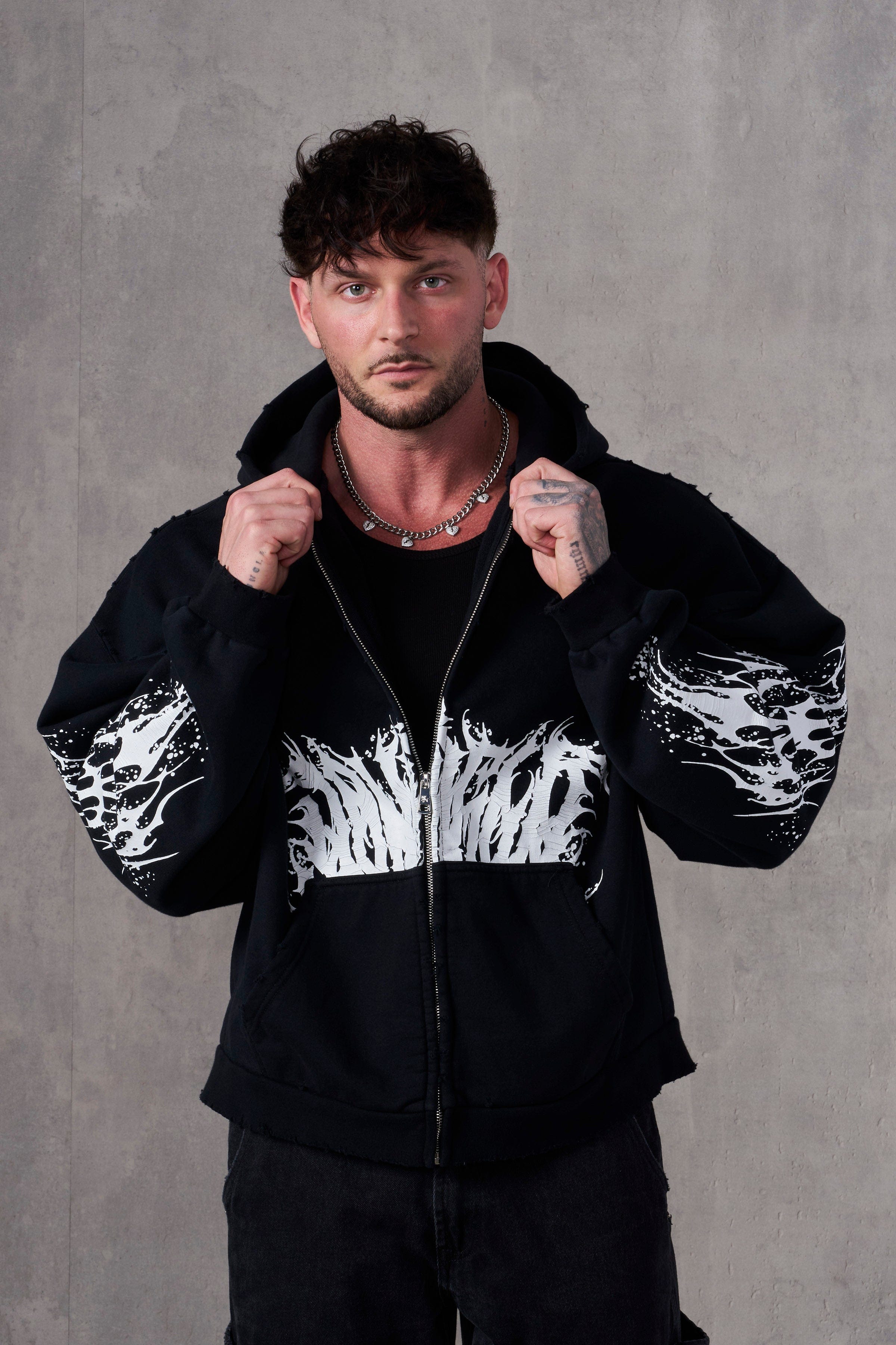 Model wearing the oversized Venom hoodie outdoors, emphasizing its comfortable fit and vintage style
