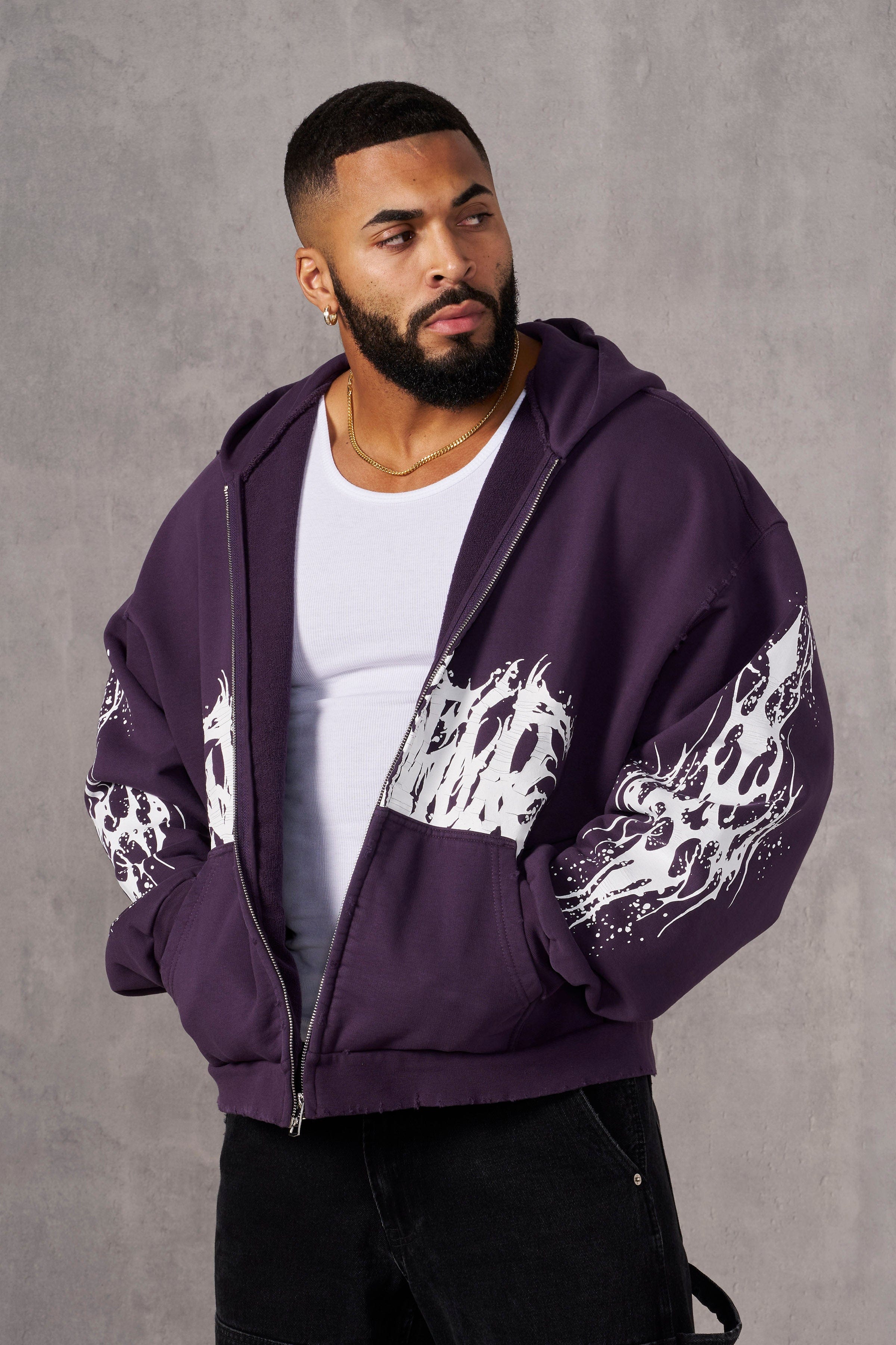 Front view of the Venom zip-up hoodie with bold graphics and premium cotton fabric