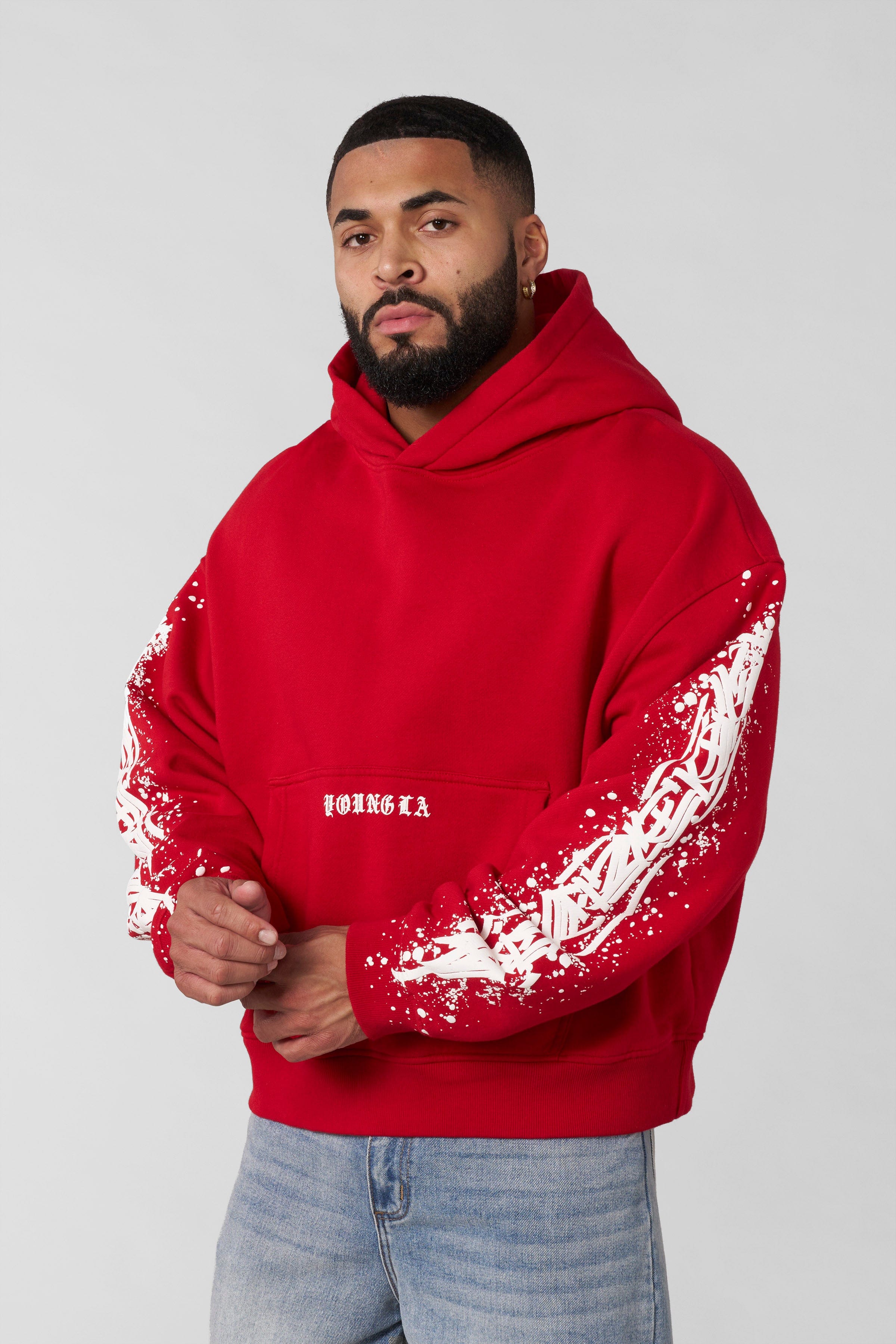 Model wearing the Cyclone hoodie, demonstrating its loose and boxy fit.