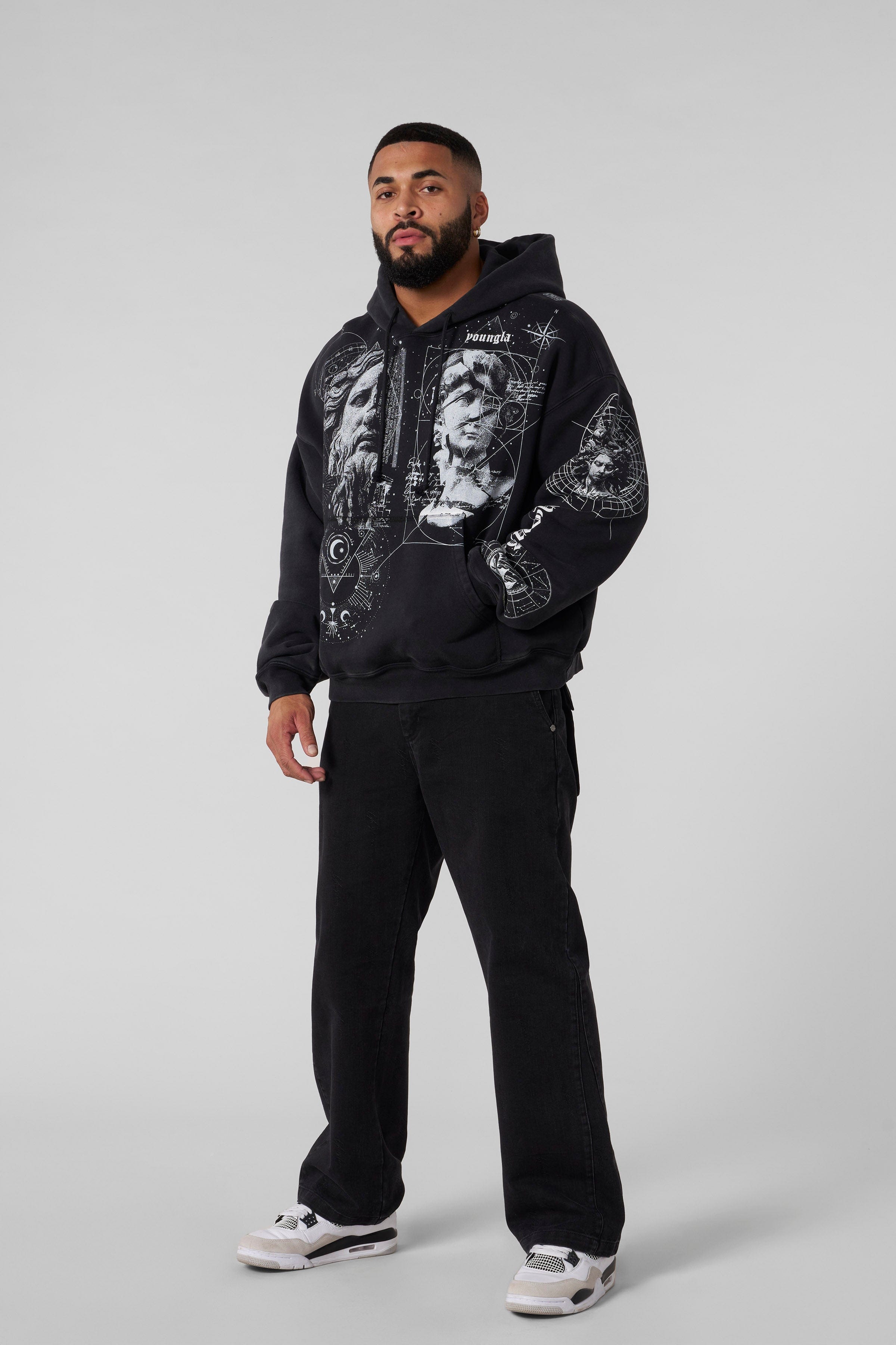 Front view of Renaissance hoodie with intricate tattoo artwork on black cotton fabric