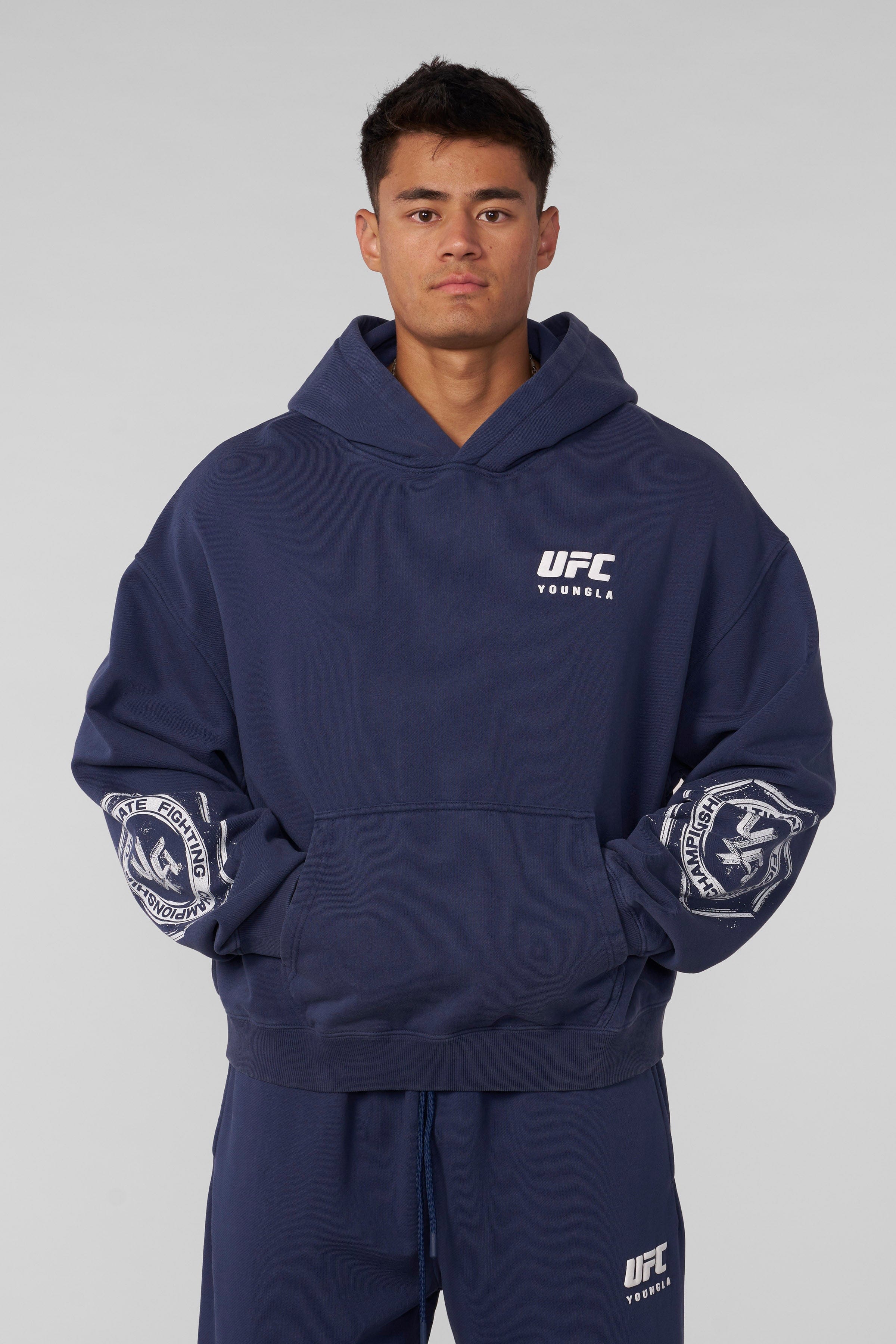 Close-up of soft fabric and relaxed fit of the UFC hoodie.