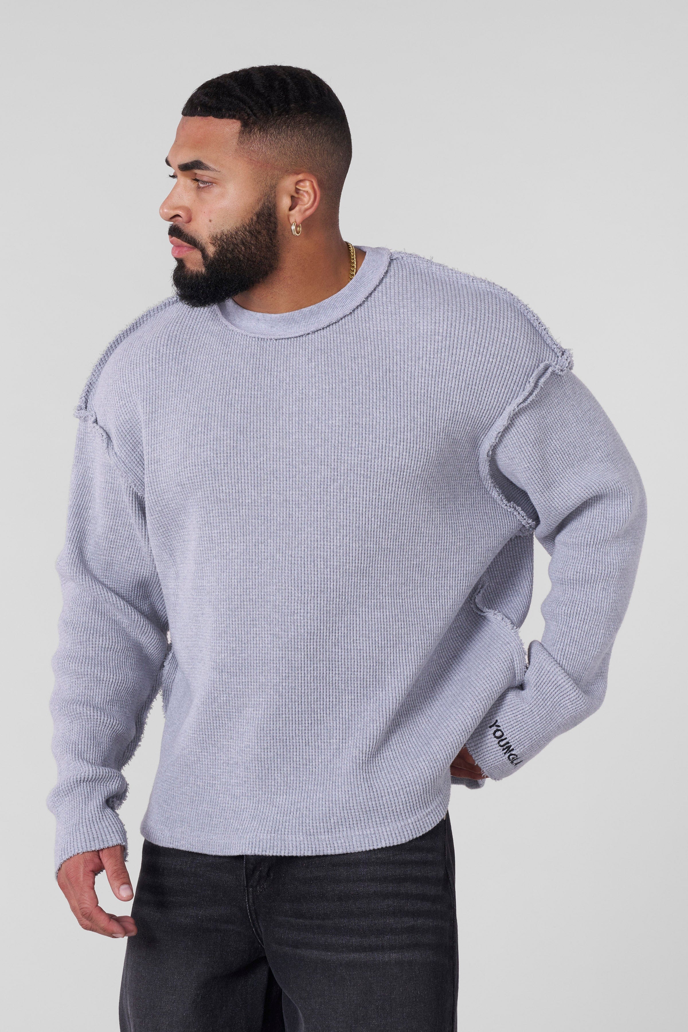 Front view of waffle thermal shirt styled for cold-weather layering