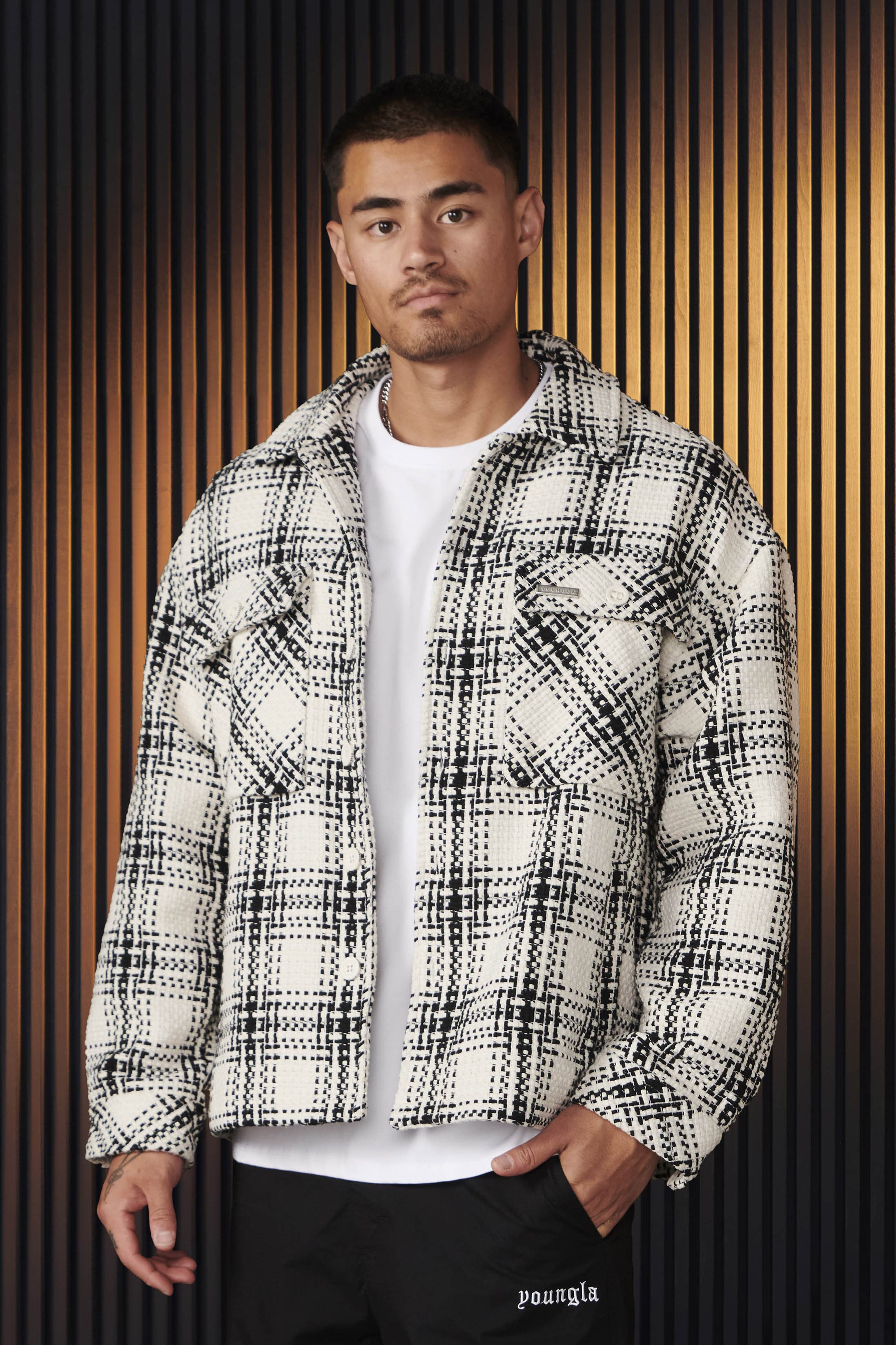 Close-up of the woven flannel jacket's textured fabric