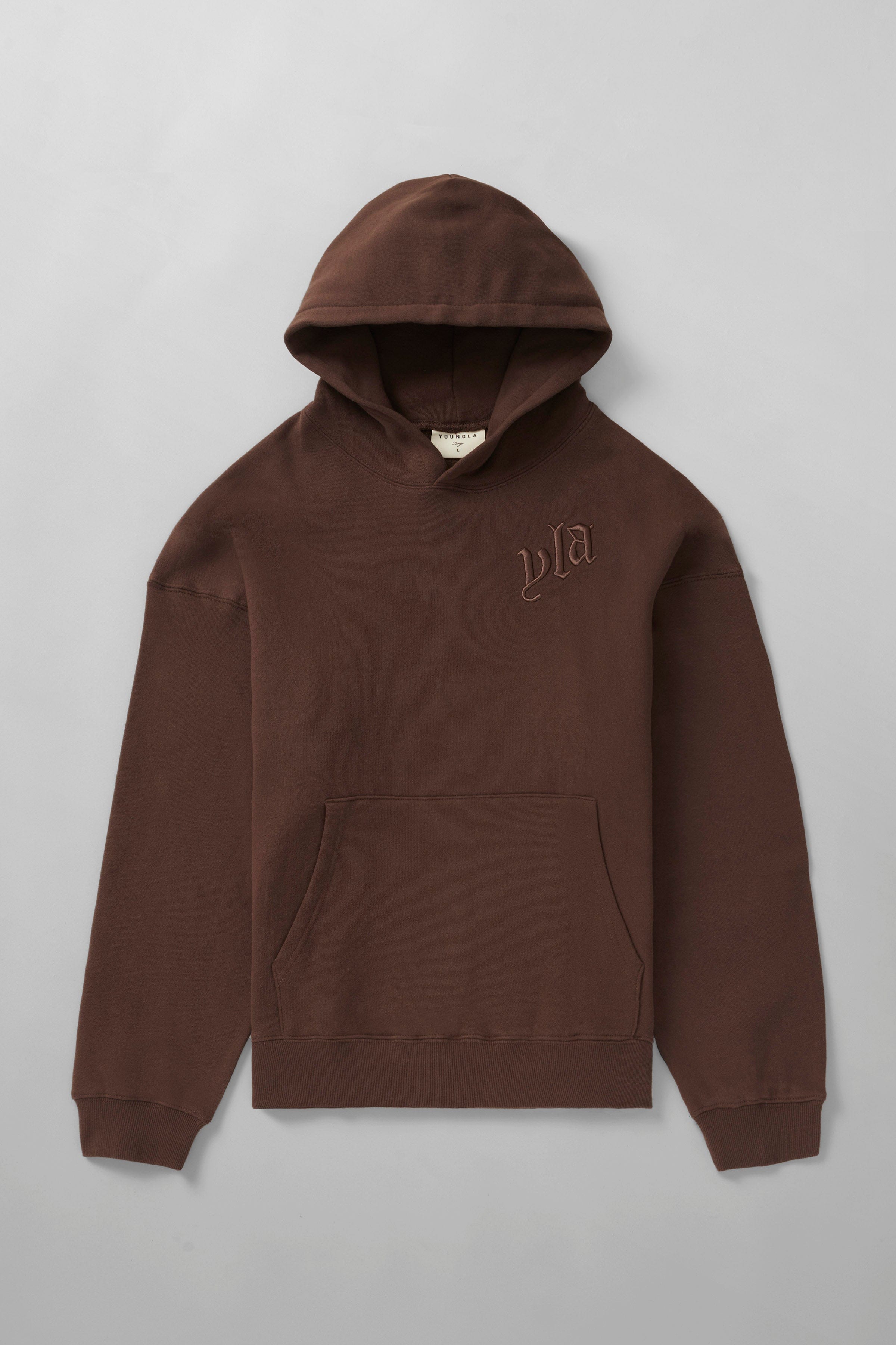 Detail of ribbed cuffs and hem on marshmallow hoodie