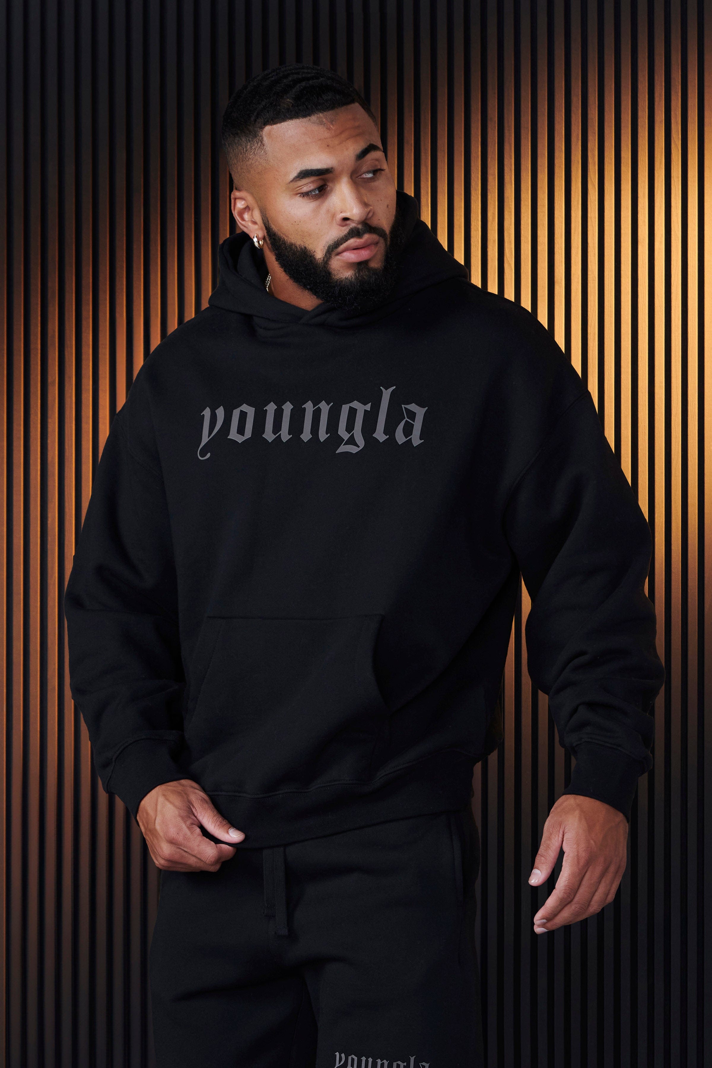 Man wearing a soft hoodie for men, showcasing relaxed fit and style.