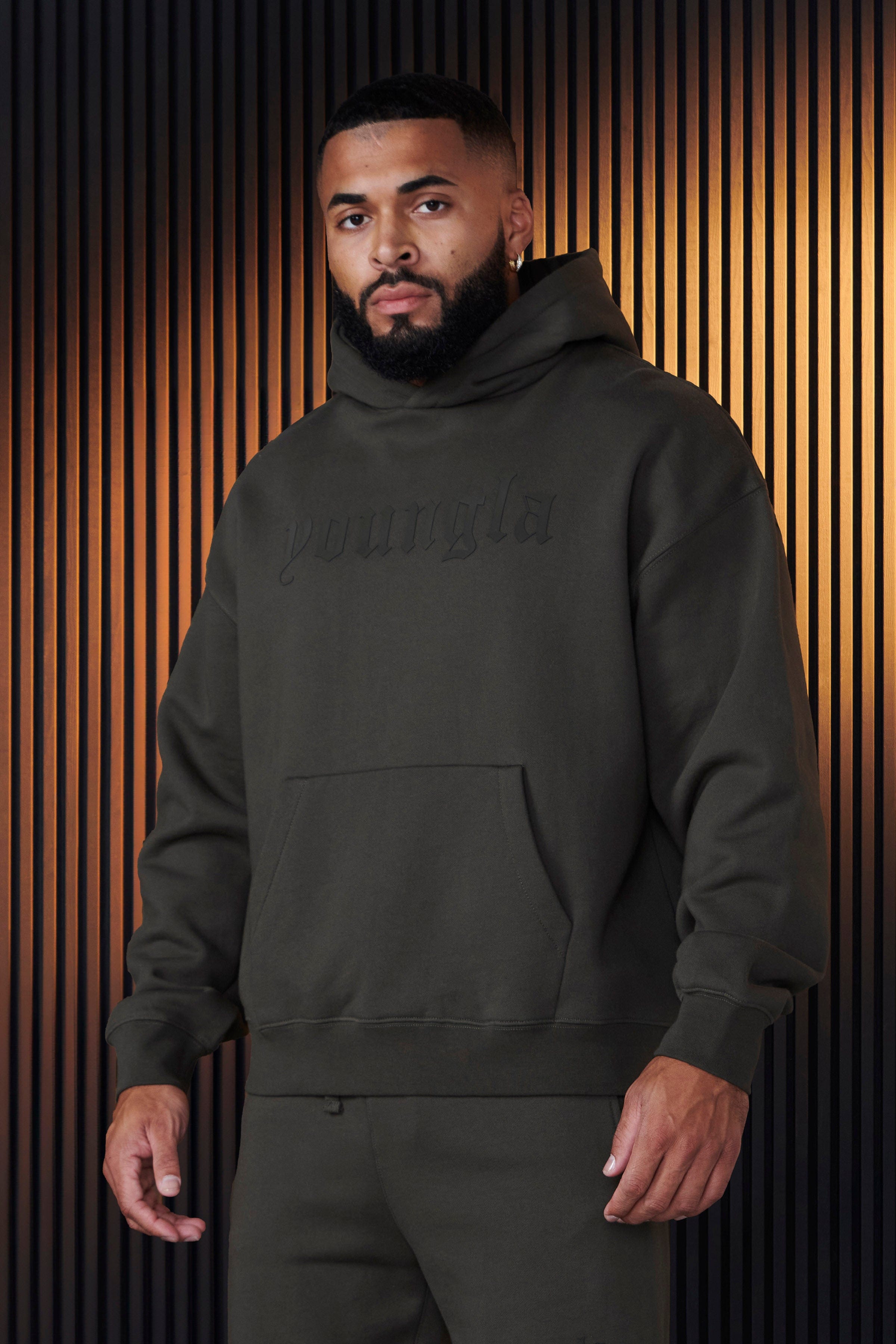 Cozy Cloud 9 fleece cotton hoodie displayed on a model outdoors.