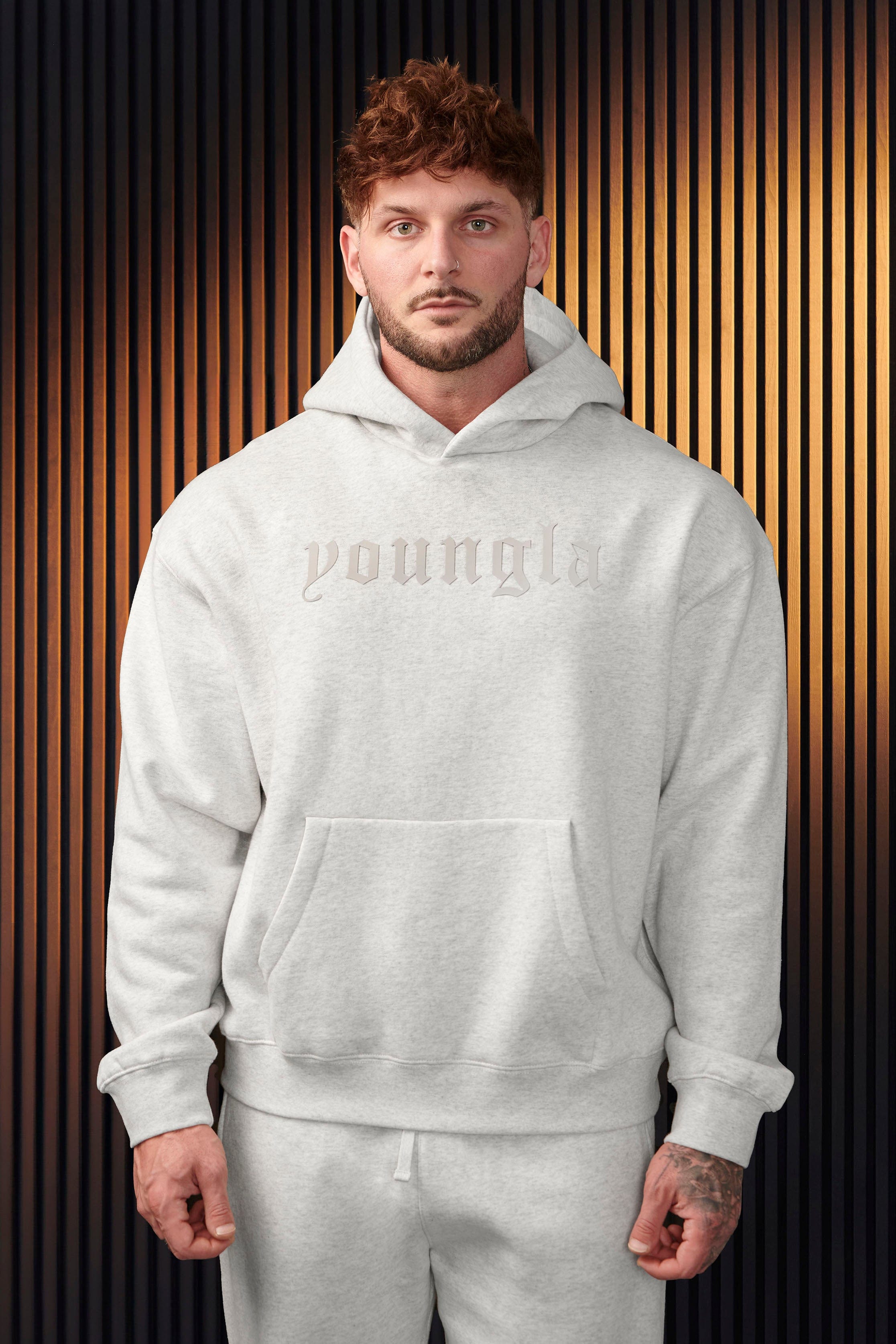 Cozy Cloud 9 fleece cotton hoodie displayed on a model outdoors.