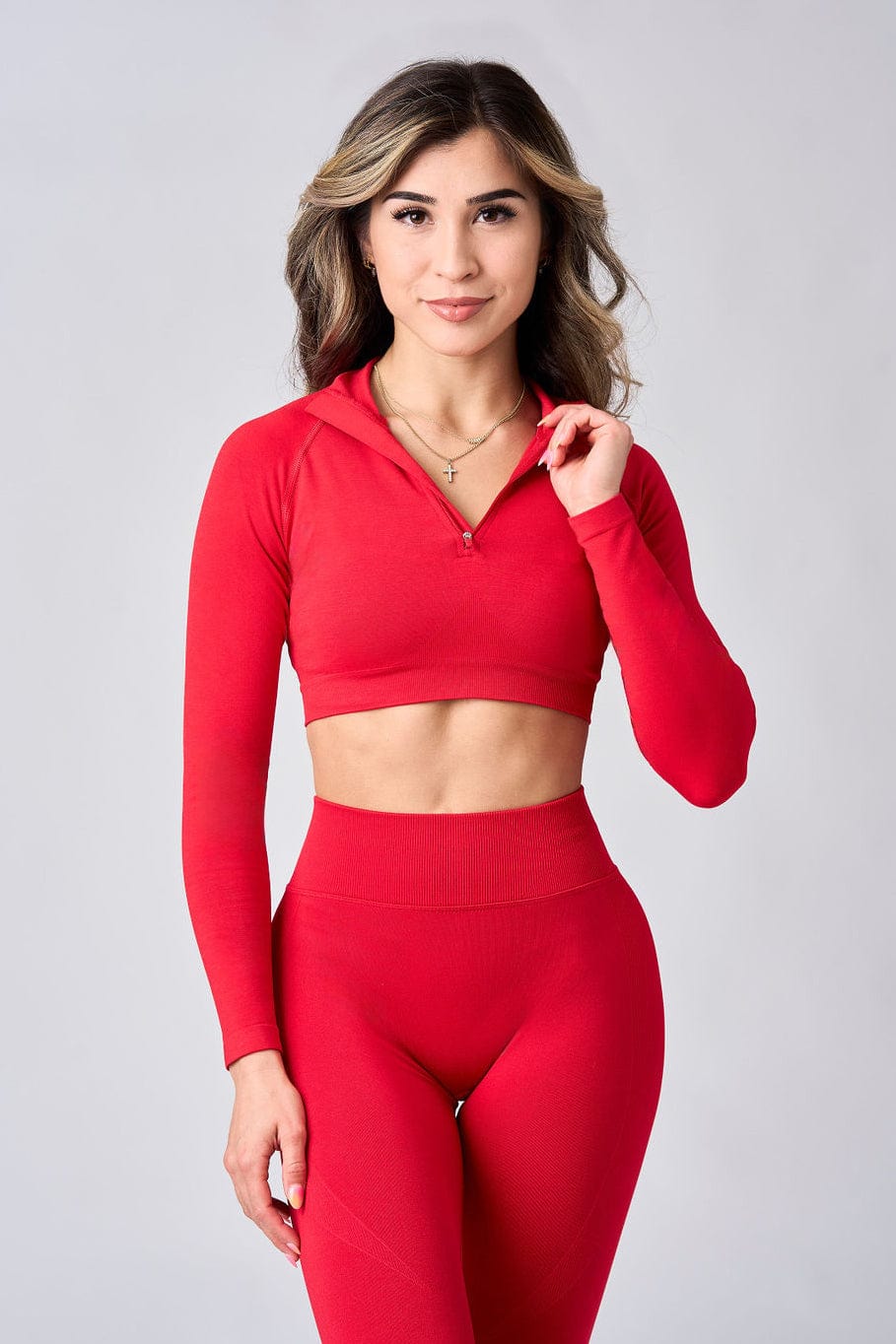 Close-up of the seamless quarter zip pullover showing fabric texture