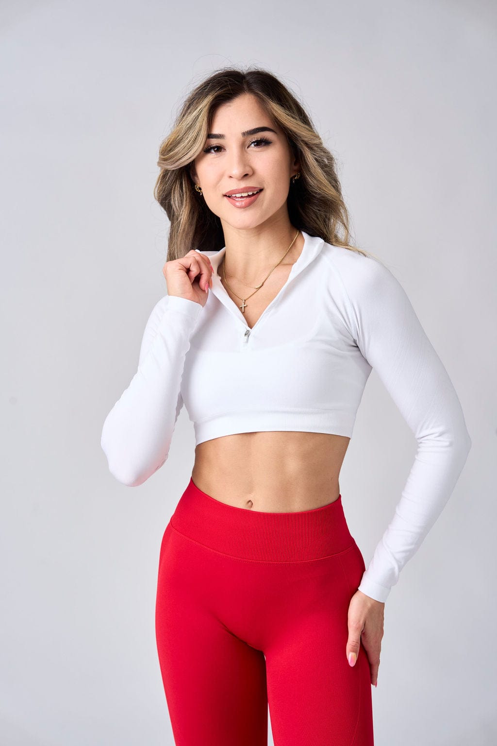 Close-up of the seamless quarter zip pullover showing fabric texture