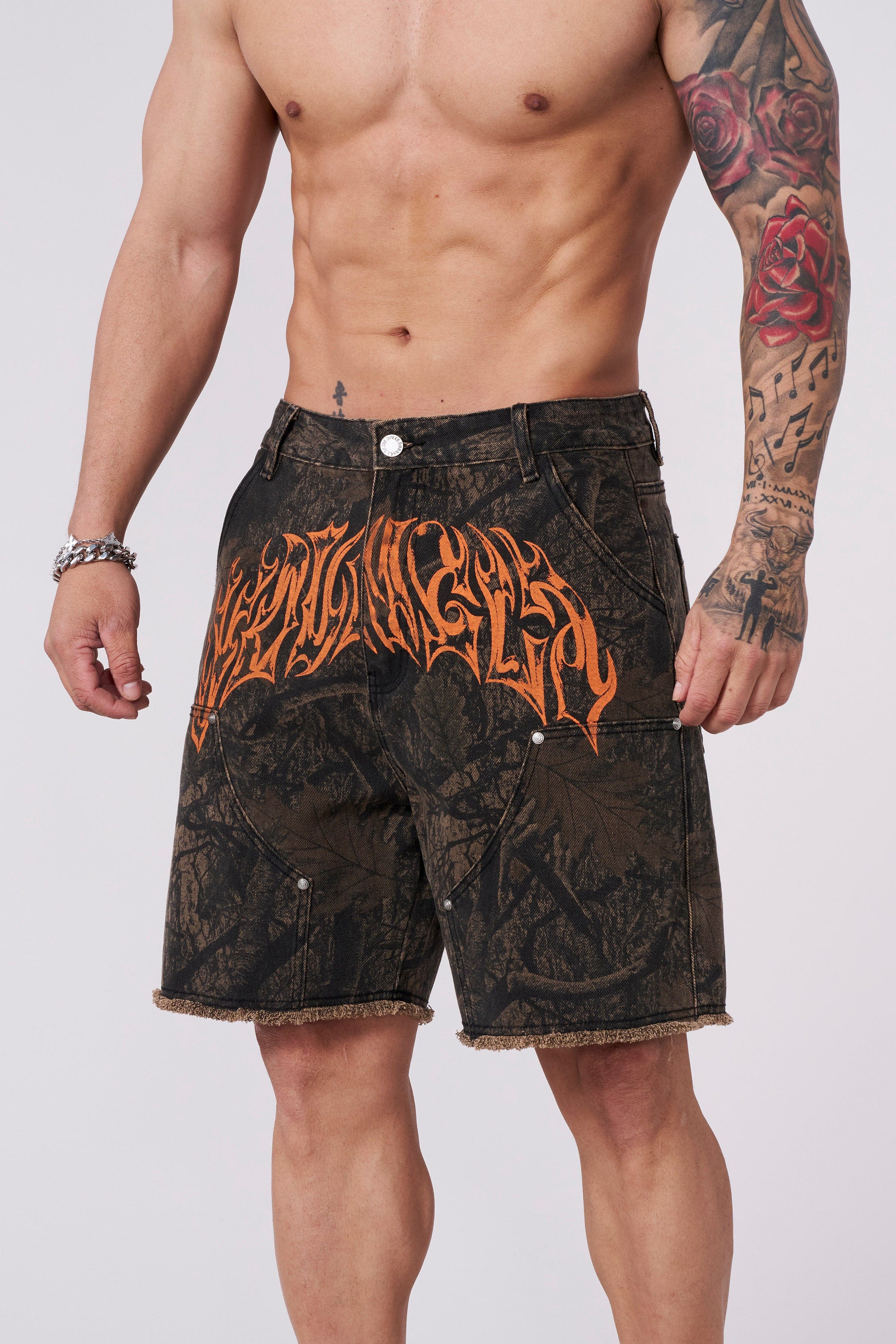 Front view of Urban Vibe Baggy Jorts with tribal logo print.