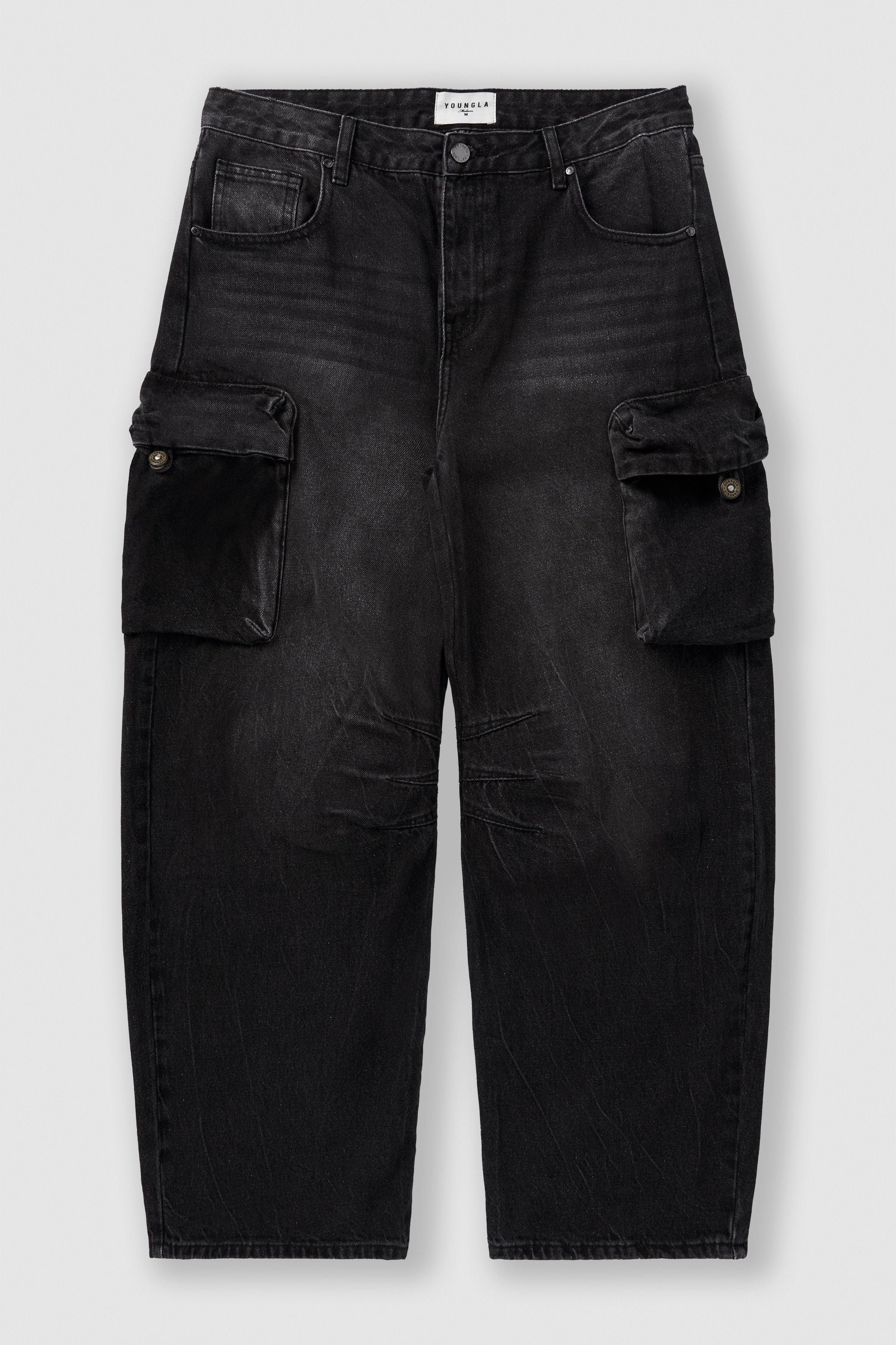 Front view of cargo jeans highlighting large cargo pockets and vintage wash
