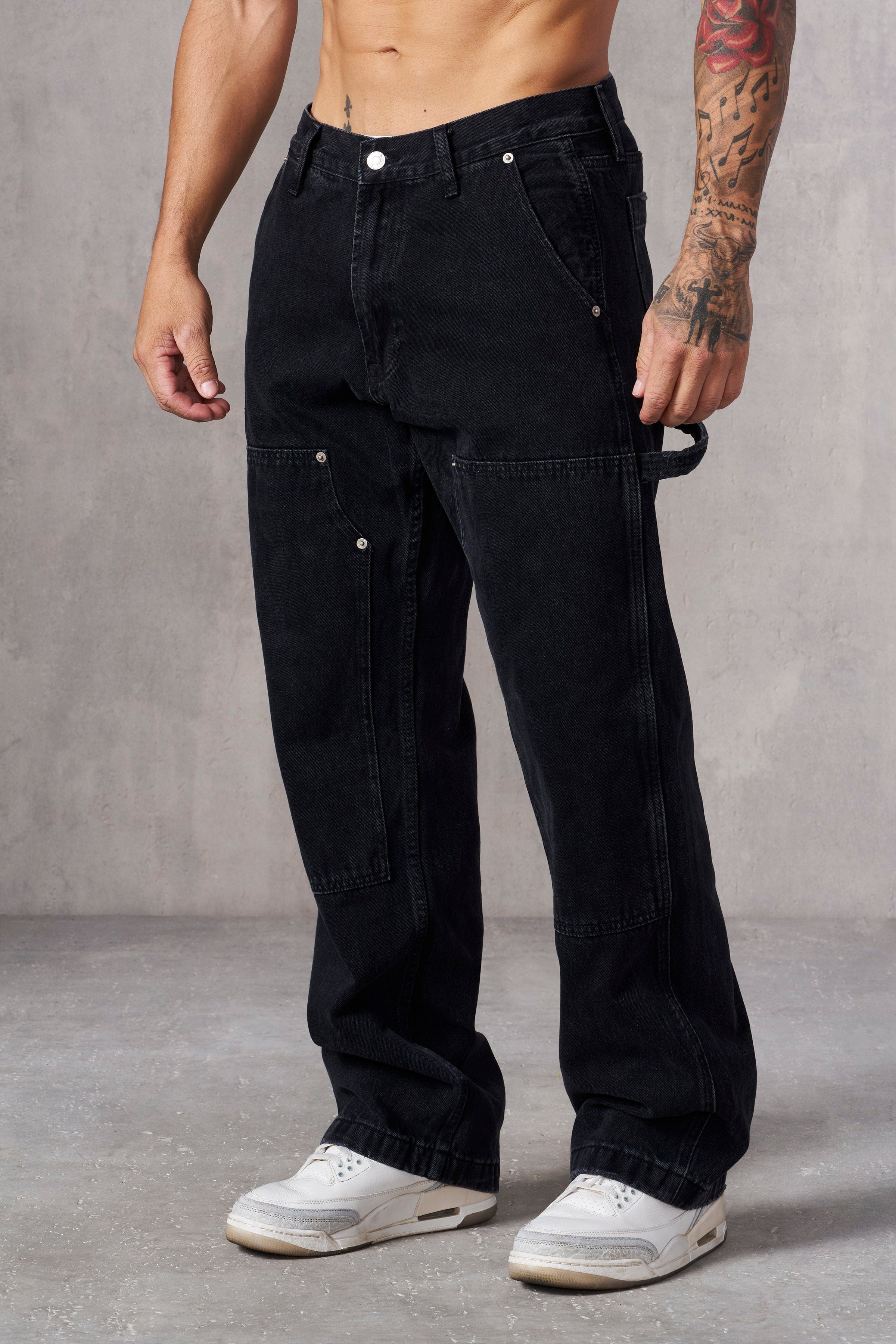 Side view showcasing the relaxed fit of mens carpenter jeans.