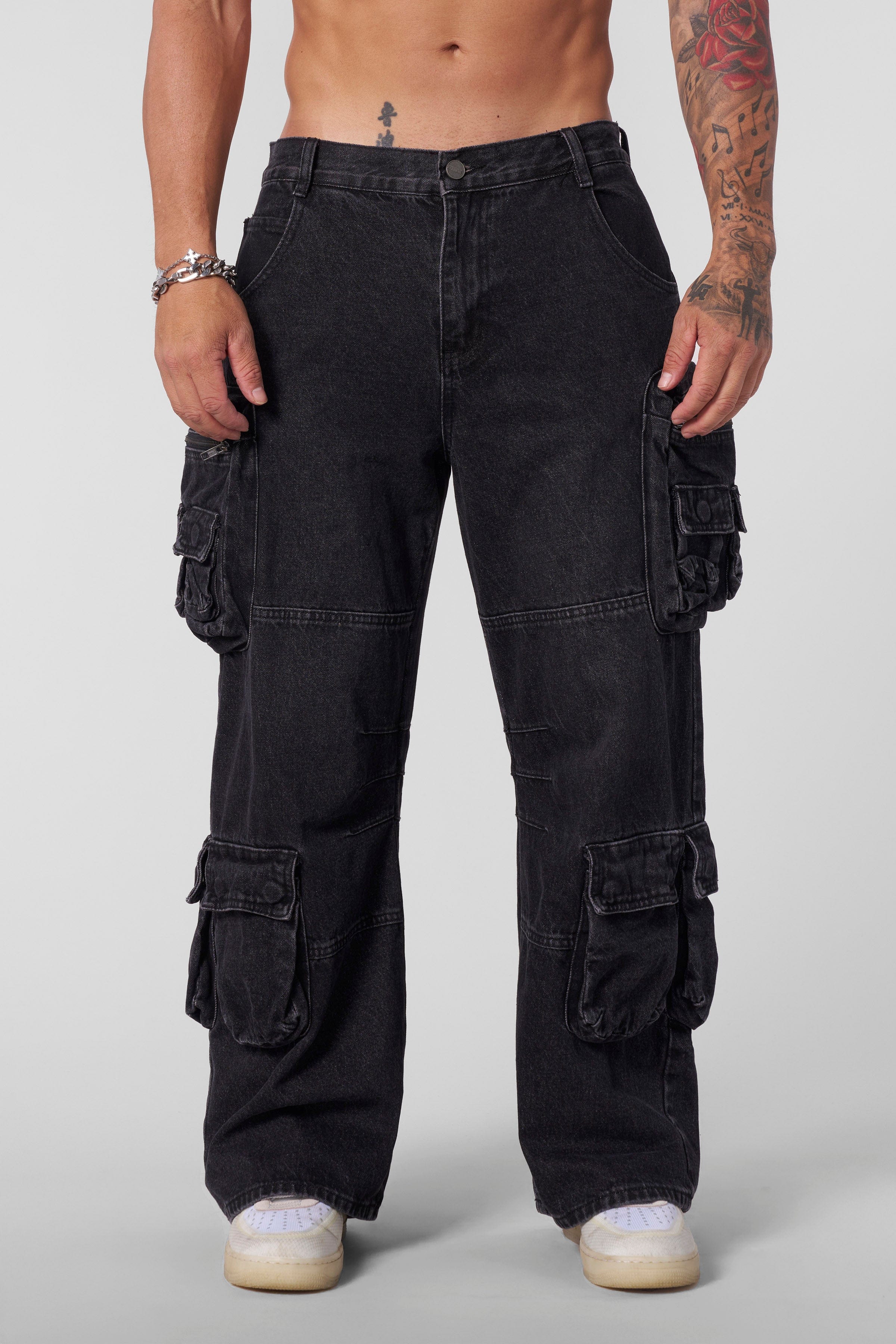 Side angle of baggy stacked jeans showcasing the relaxed fit.