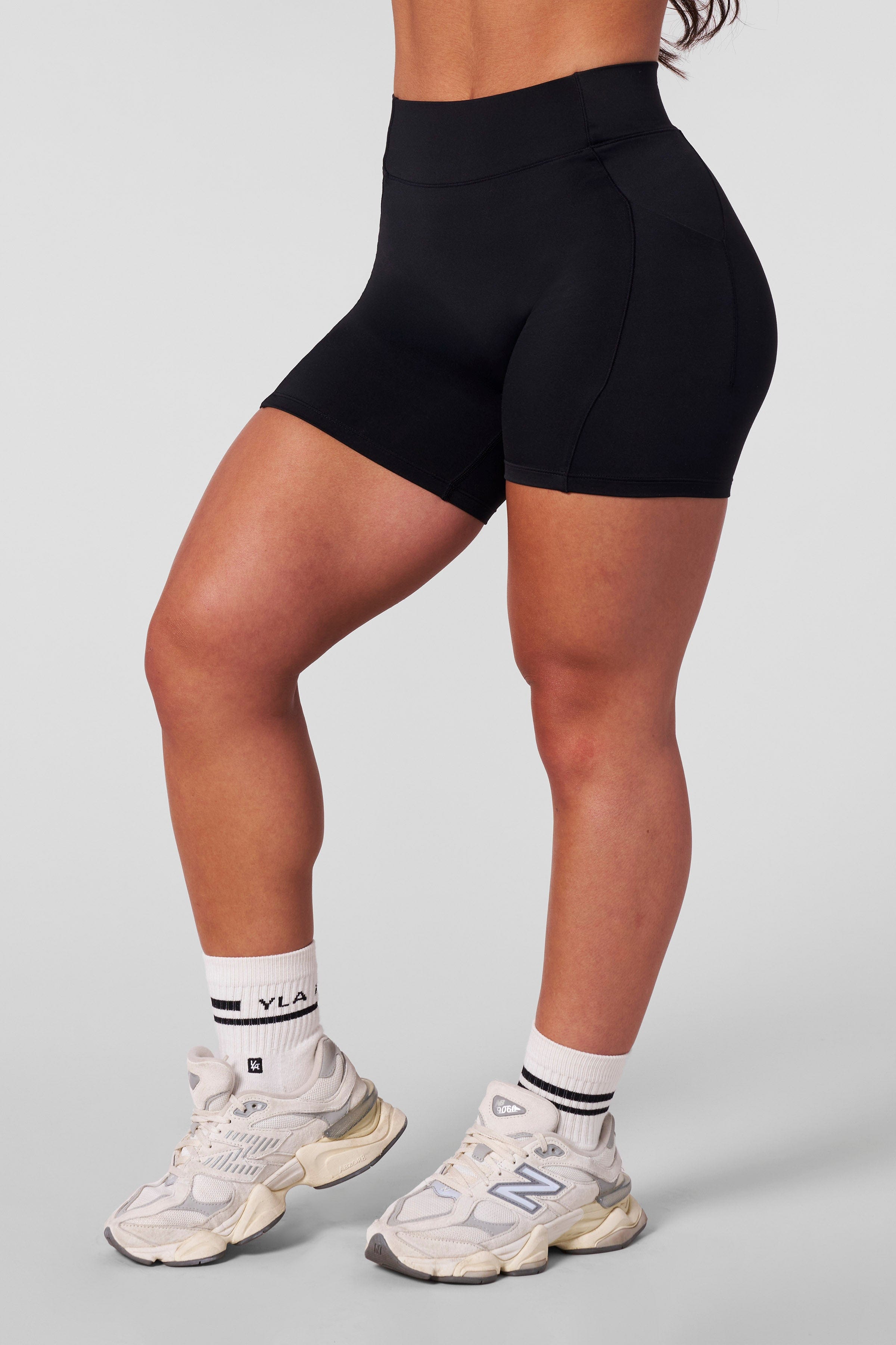 Athlete in high-impact activewear performing lunges in these shorts