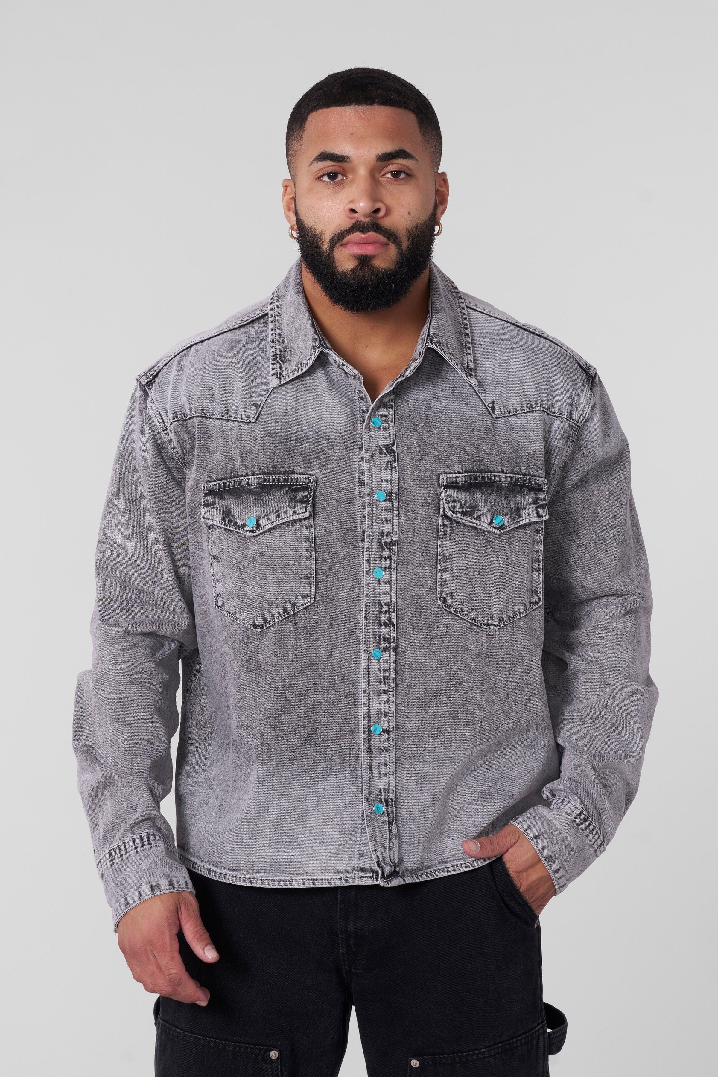 Model wearing the western denim shirt in a casual setting.