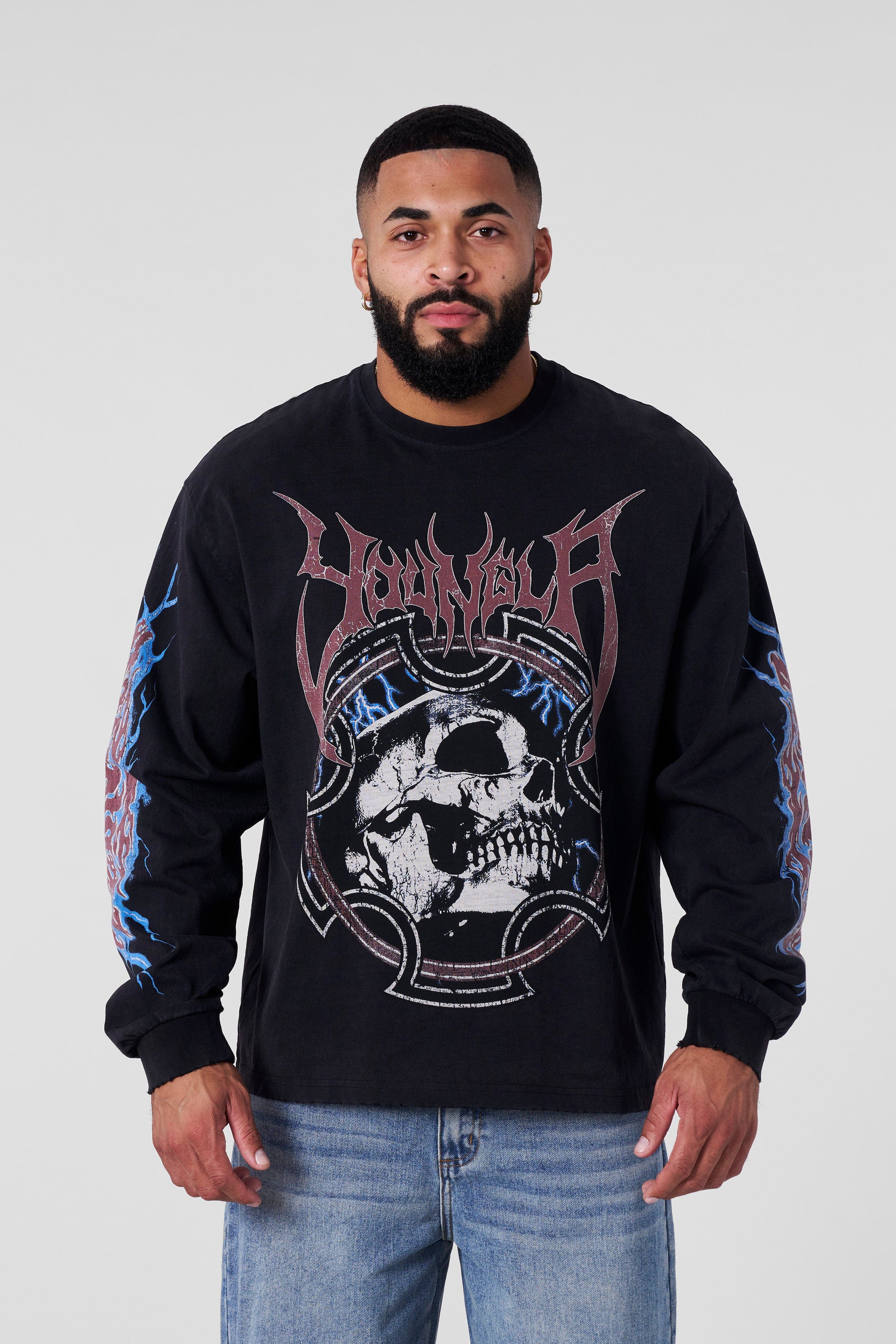 Front view showing full distressed graphic on white long sleeve shirt