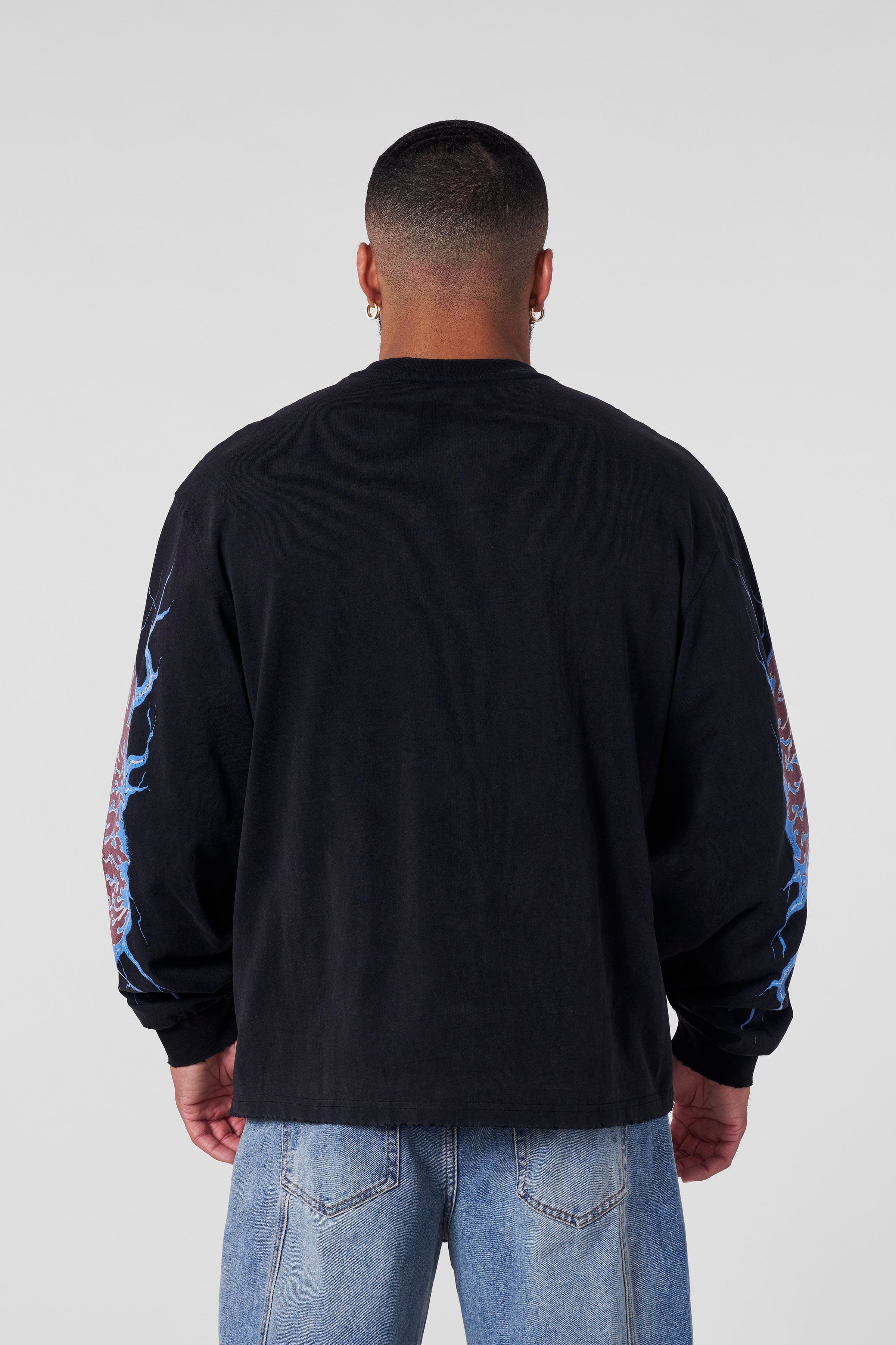 Close-up of Outcast long sleeve shirt sleeve detailing