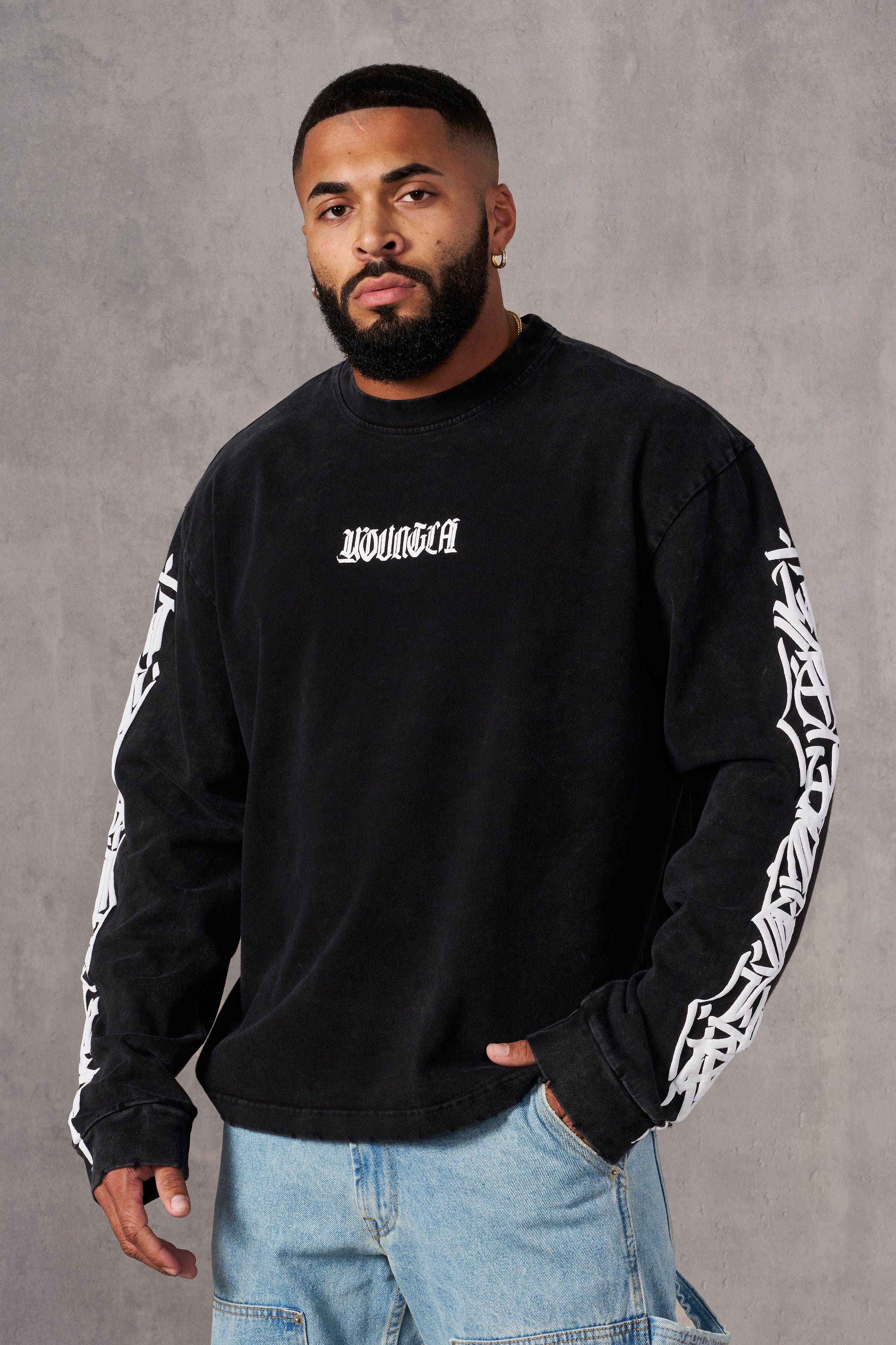 Front view of Aura Vintage Long Sleeve T-Shirt showcasing distressed cuffs.