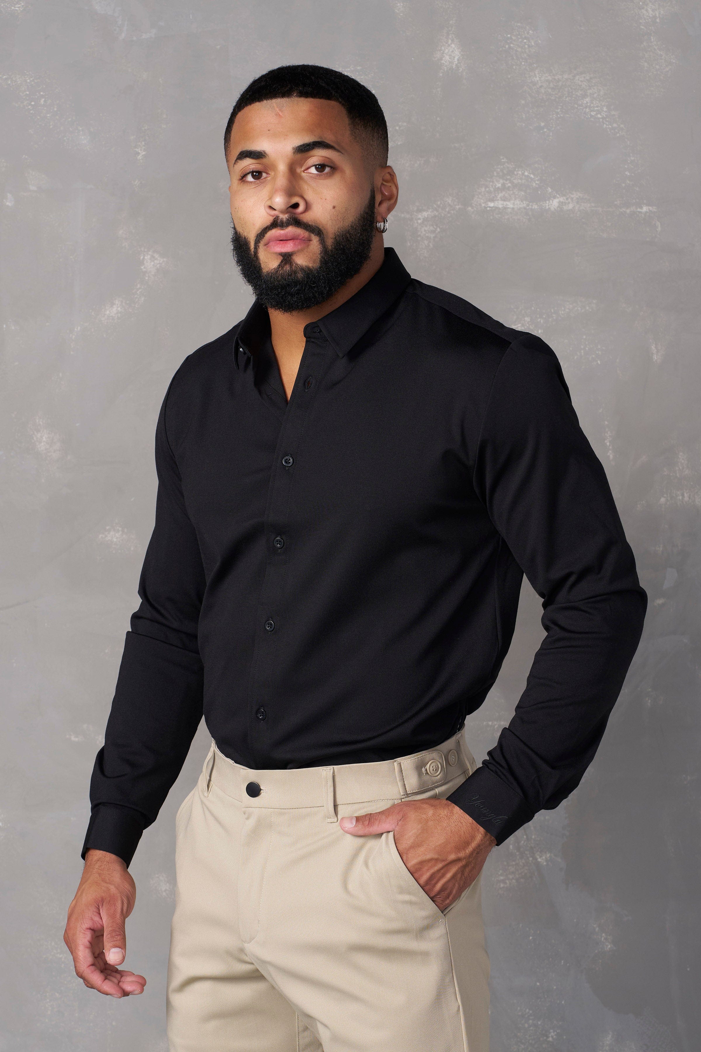 Close-up of a tailored dress shirt showcasing its fabric and fit.