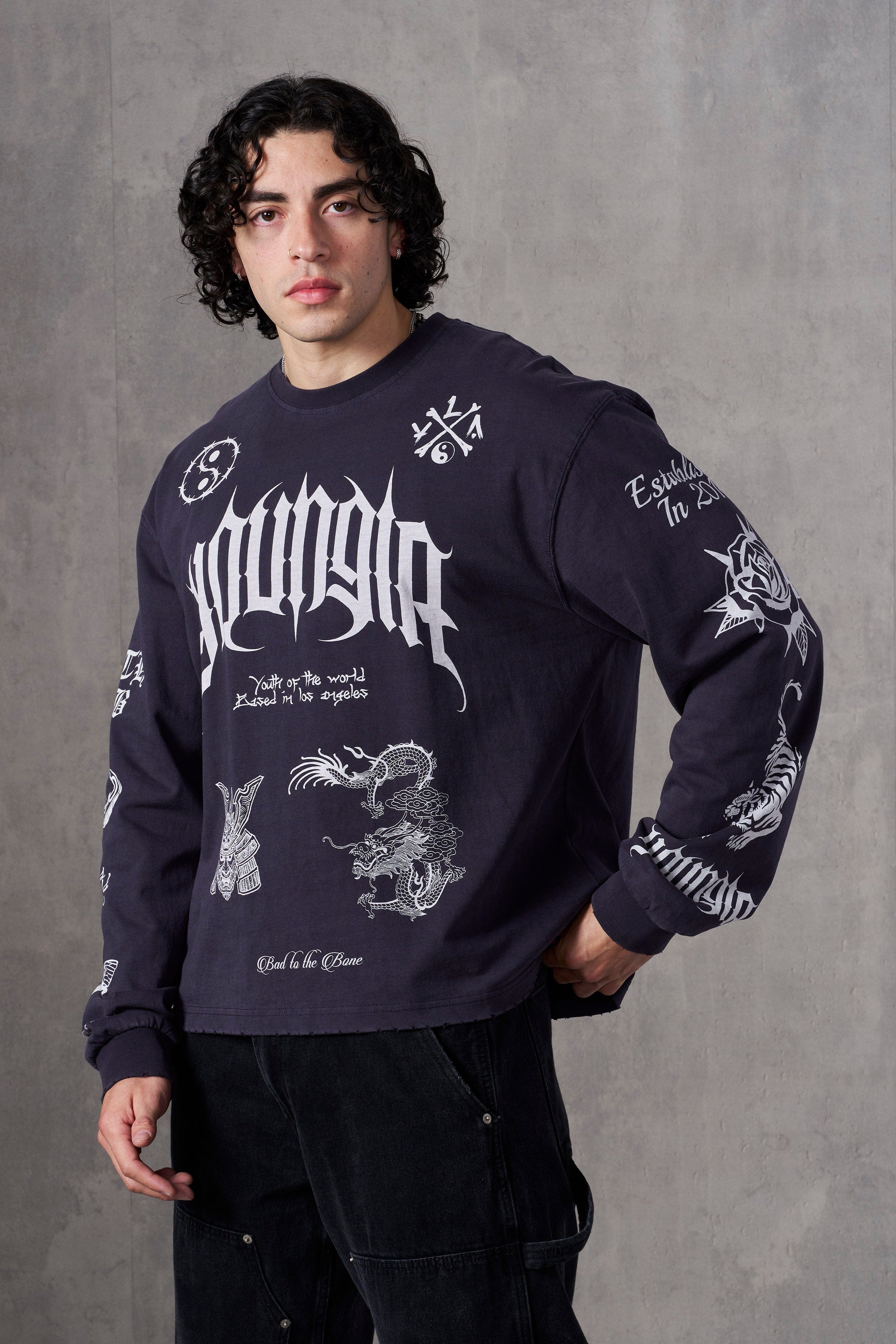 Urban photo showing how graphic tees men wear blend streetwear and comfort