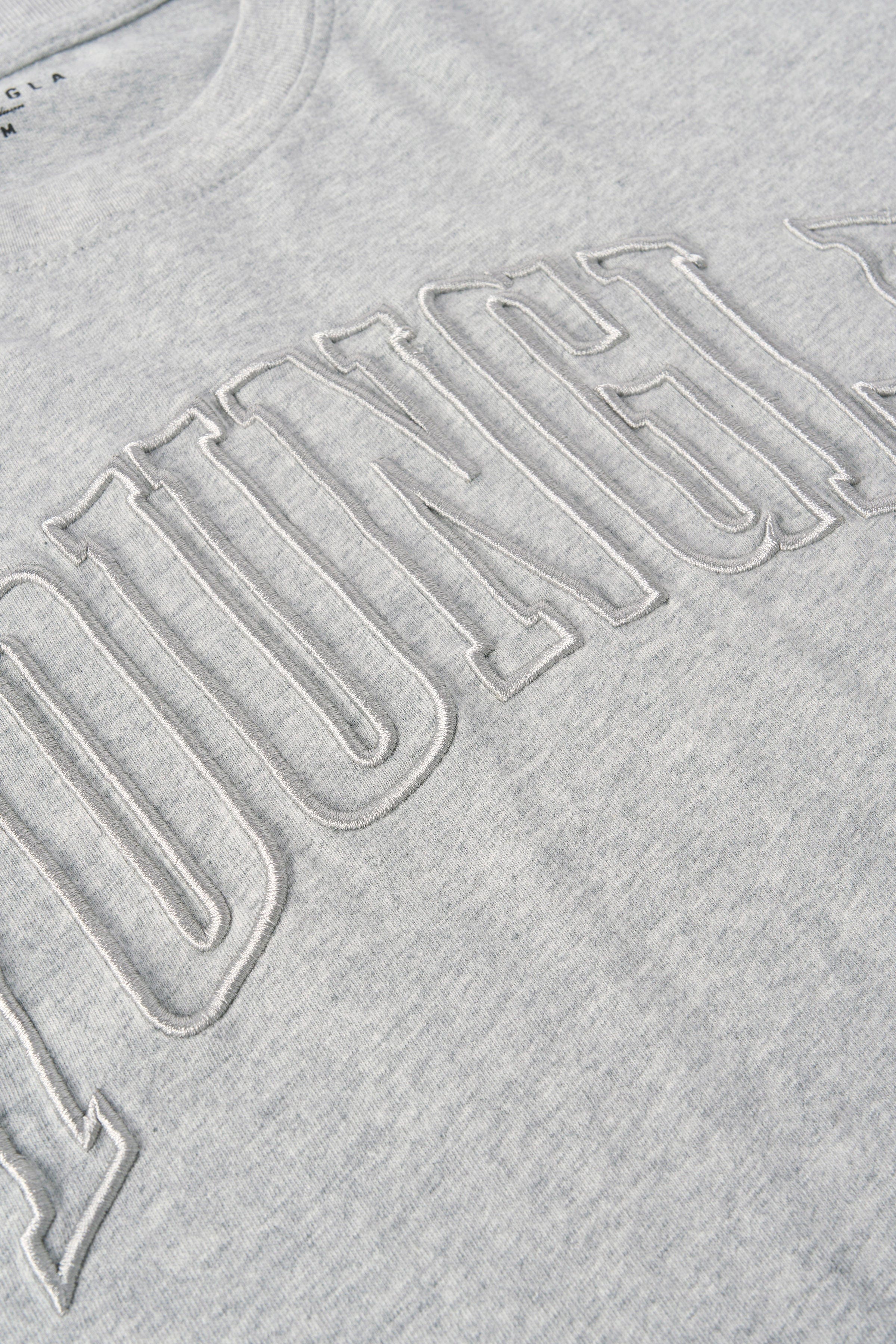 Side view of the cotton camo t shirt, highlighting its loose fit and comfort.
