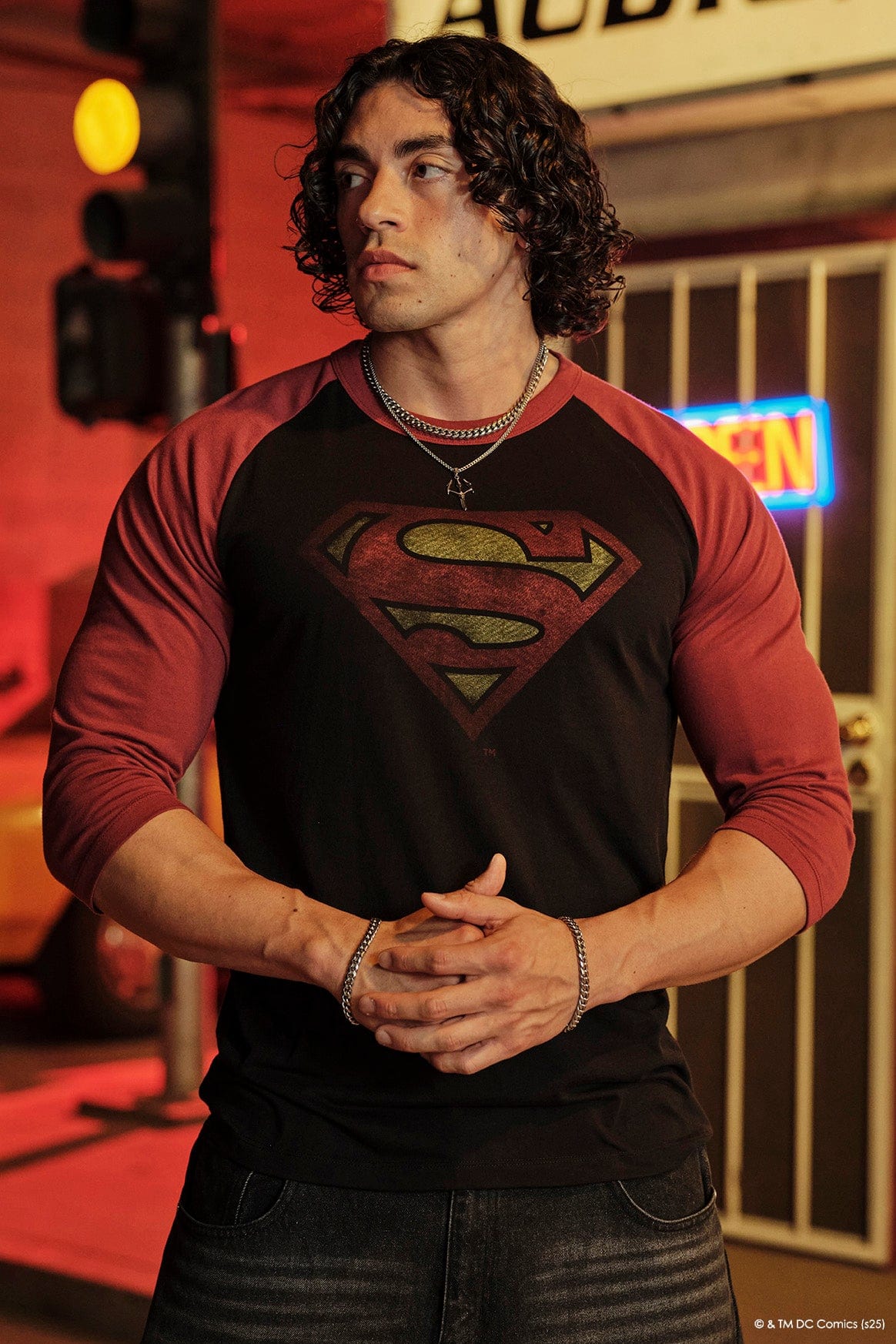 Model showcasing the fitted design of the Superman compression shirt.