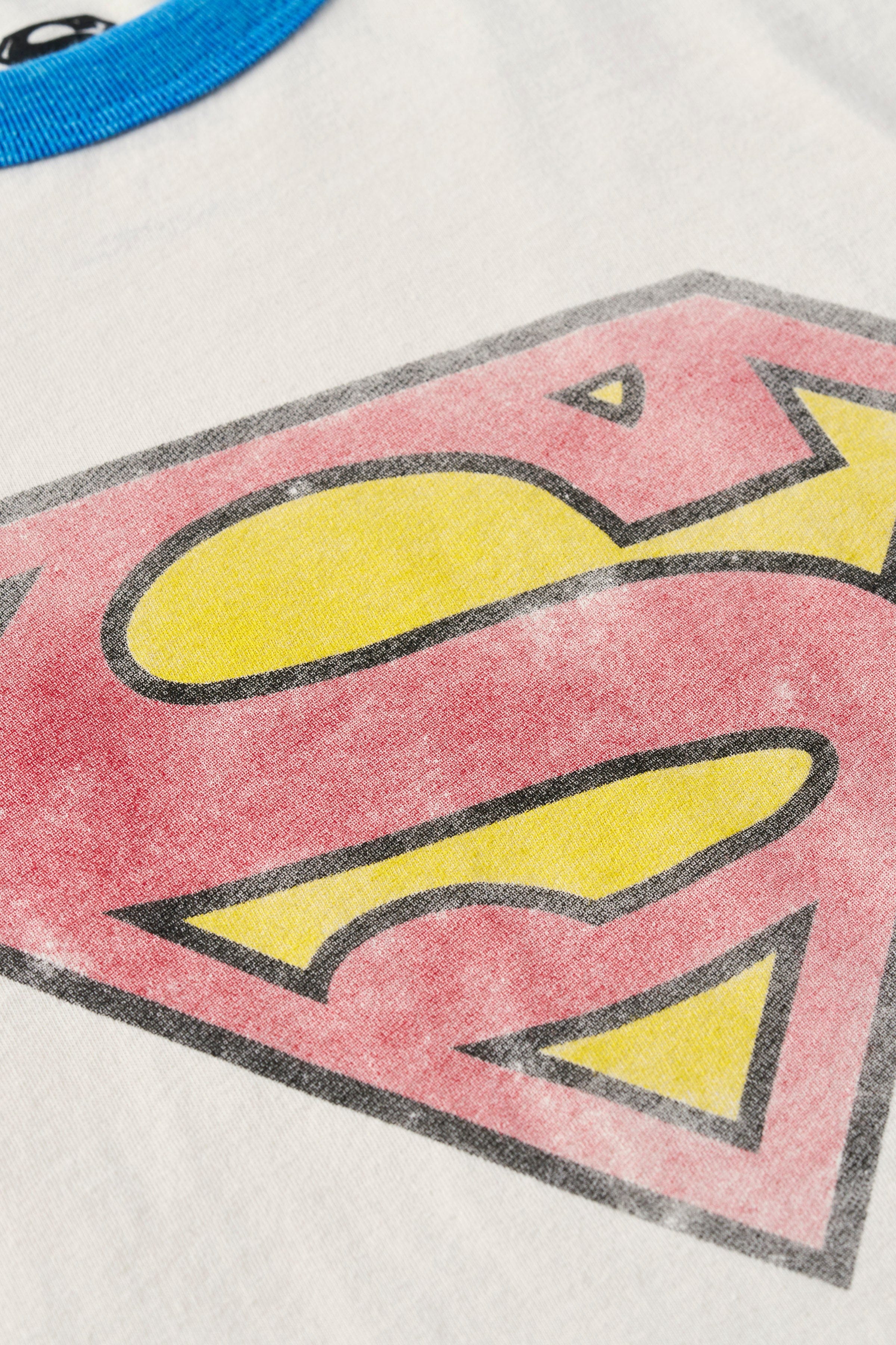 Front view of a vintage Superman raglan t-shirt with contrast sleeves.