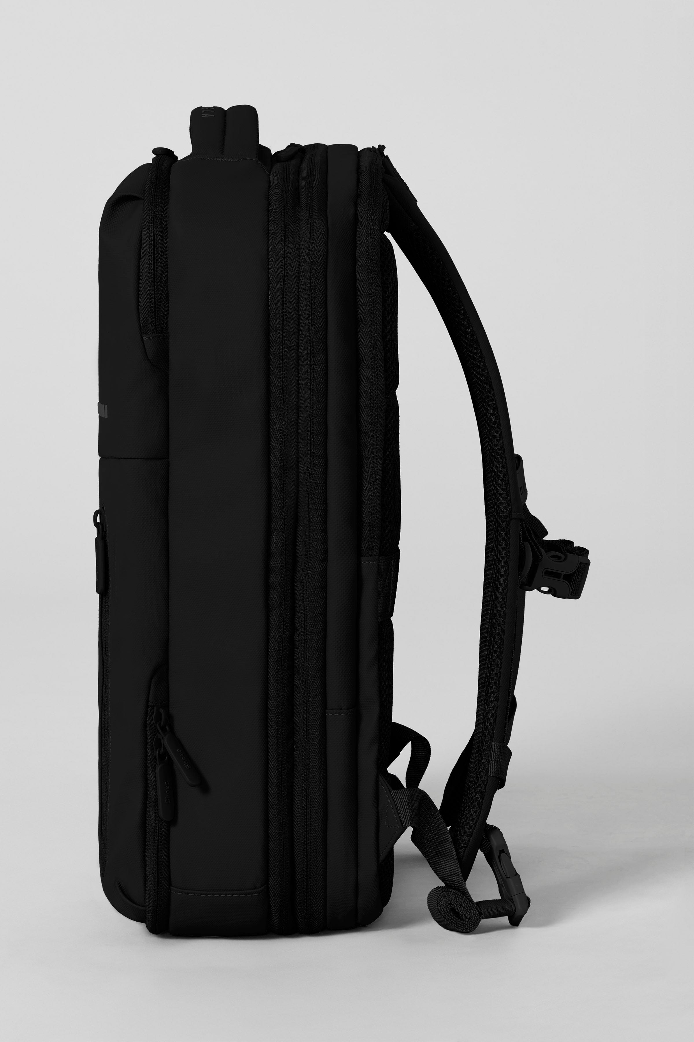 Front view of the Expedition Pro Backpack showing quick-access pockets and sleek design