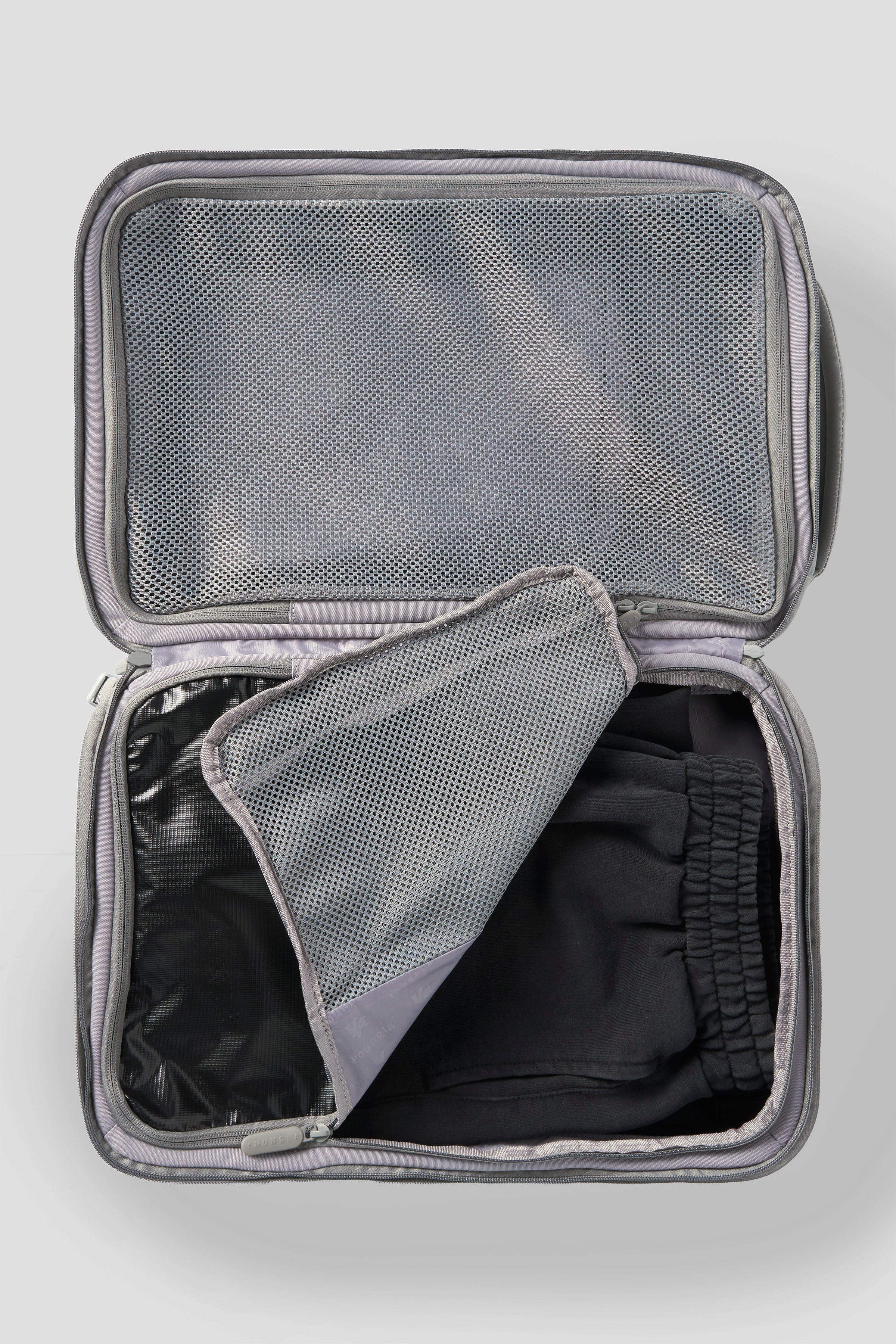 Interior shot of the backpack with laptop and organized mesh pockets