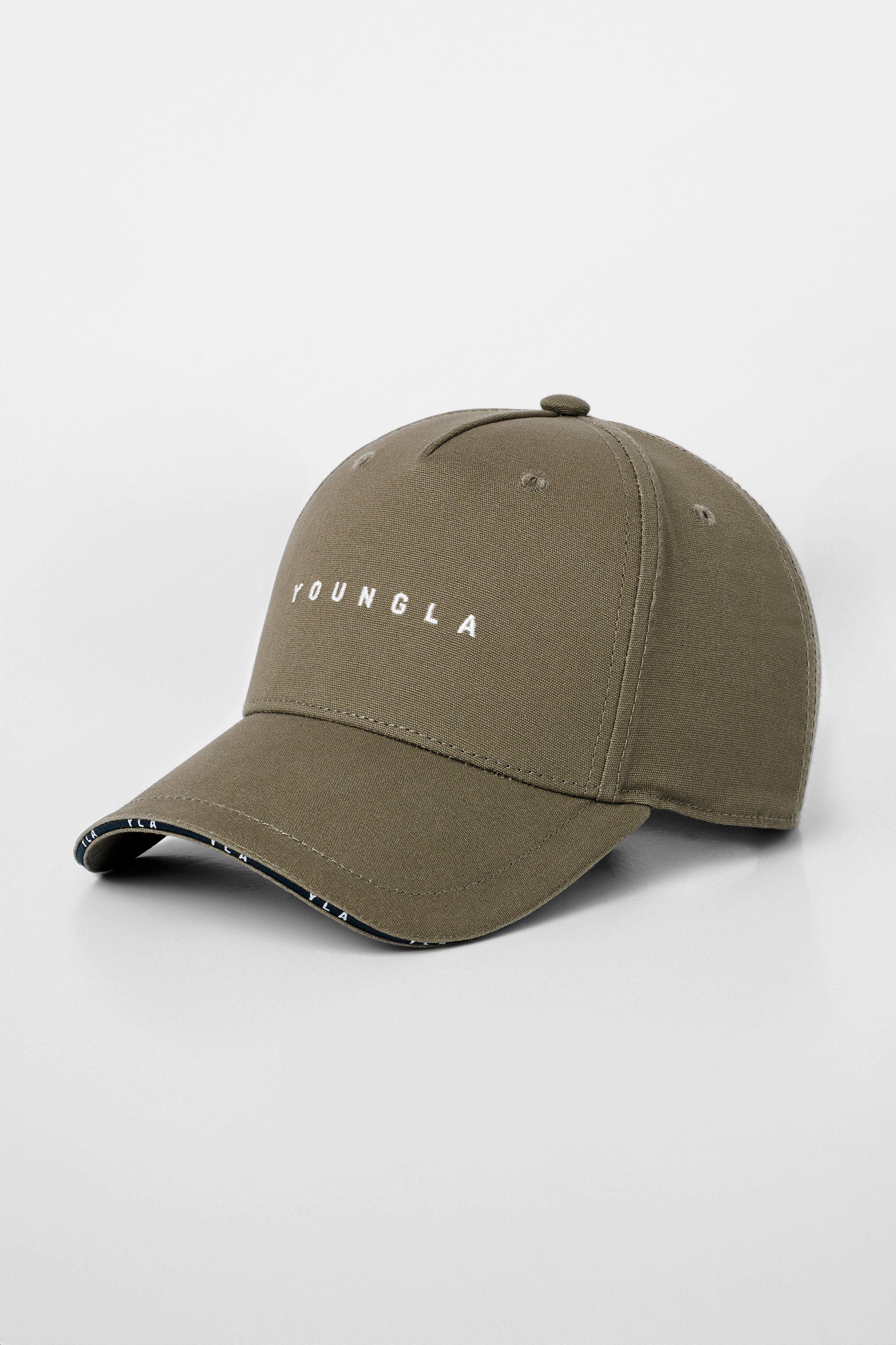 YoungLA cotton baseball hat worn outdoors, showcasing structured brim and piping