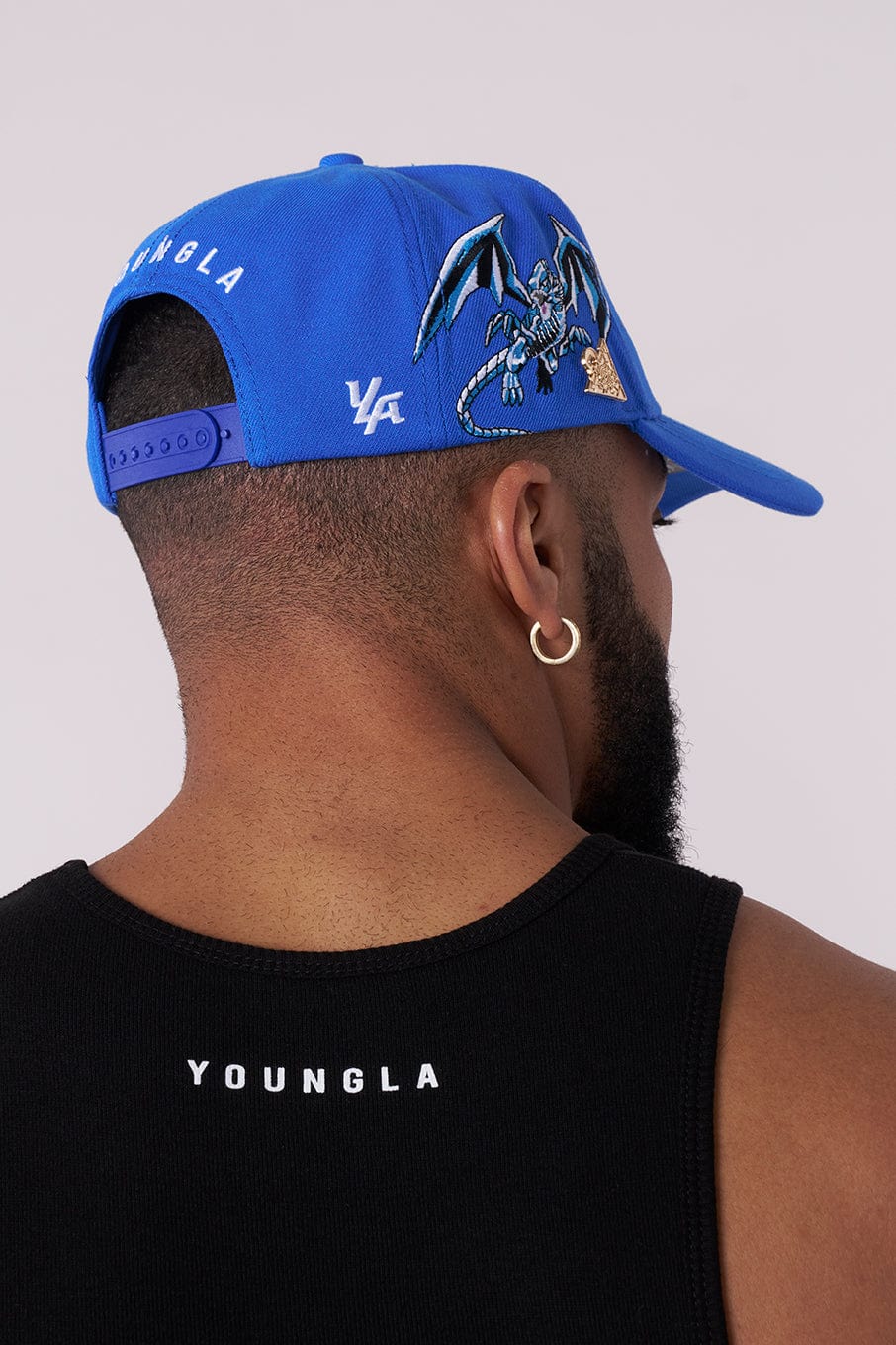 Model wearing the Yu-Gi-Oh!® cap at an anime convention.