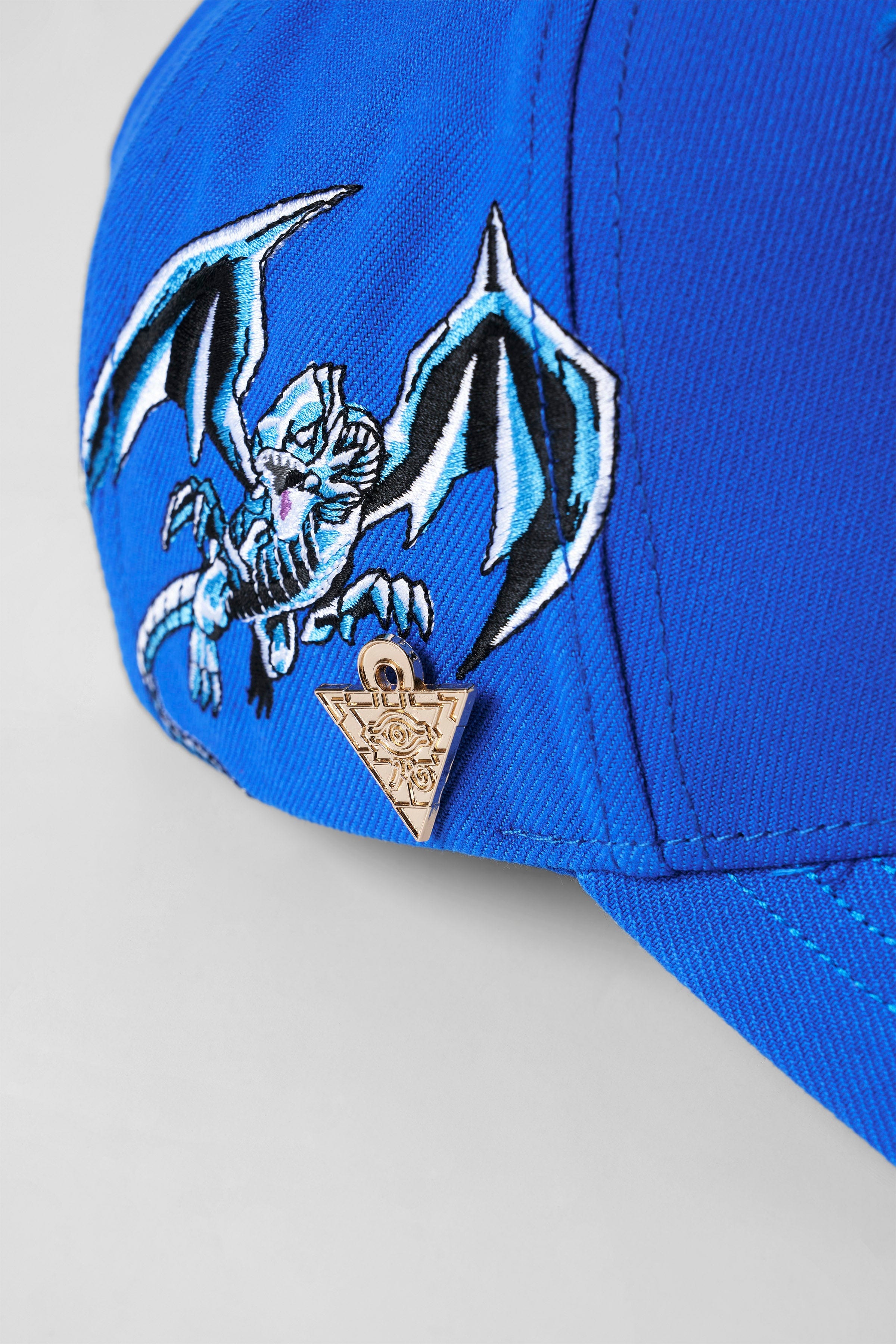 Close-up of the removable Yu-Gi-Oh!® pin on the cap.