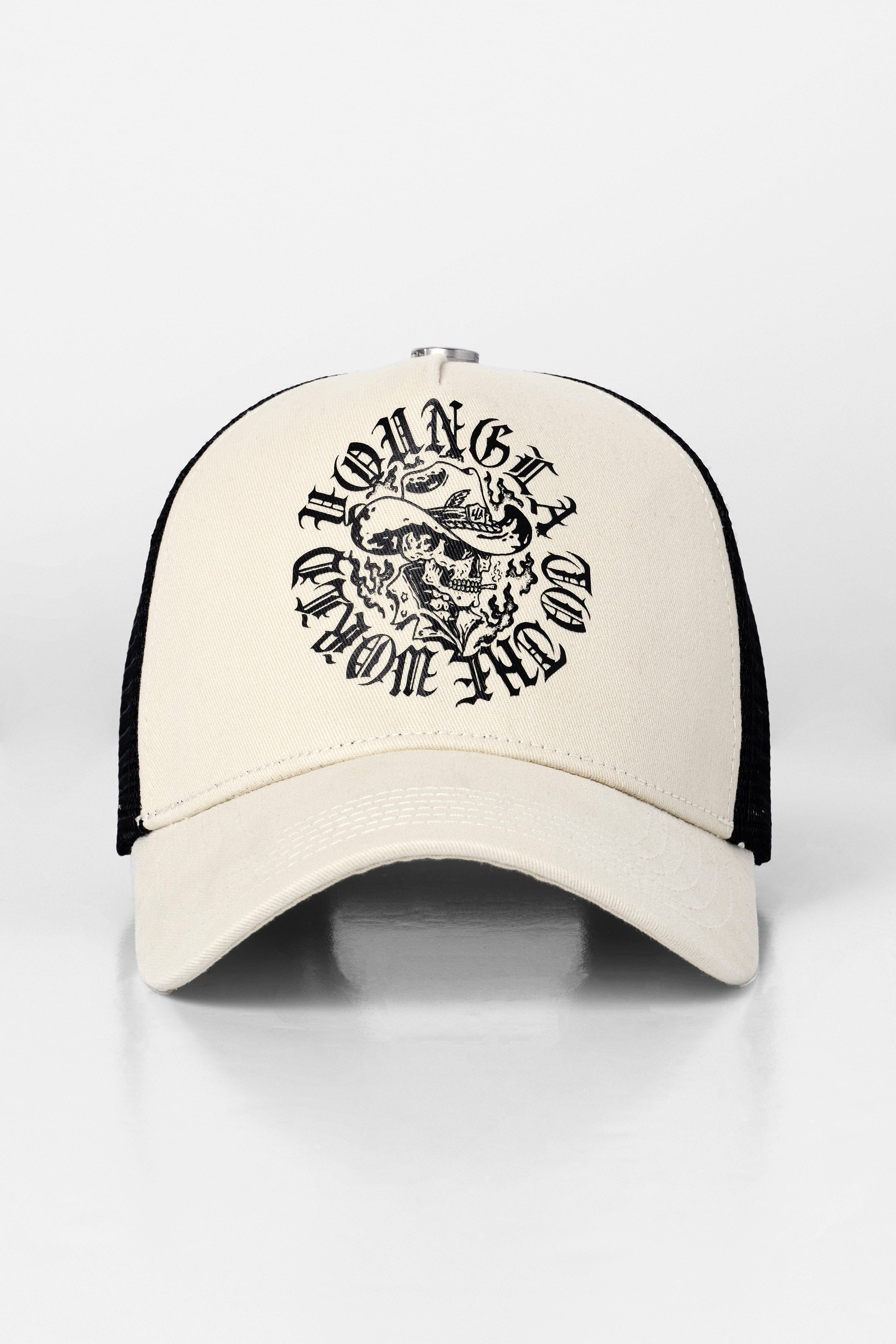 Western Dream Trucker Hat showcased against a rustic background, perfect for rodeo events.