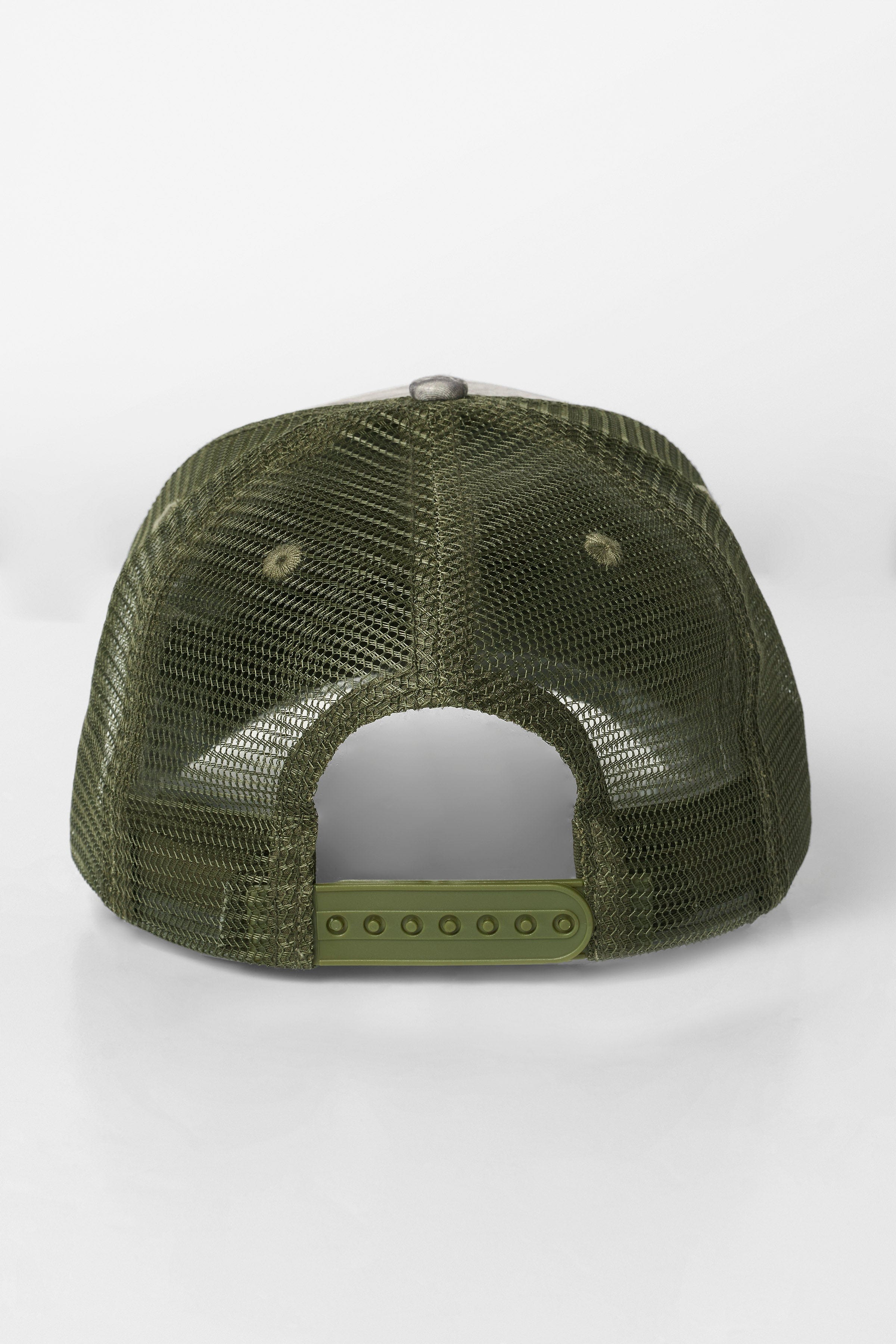 Front angle of camo trucker hat showing LA embroidery and tree camouflage