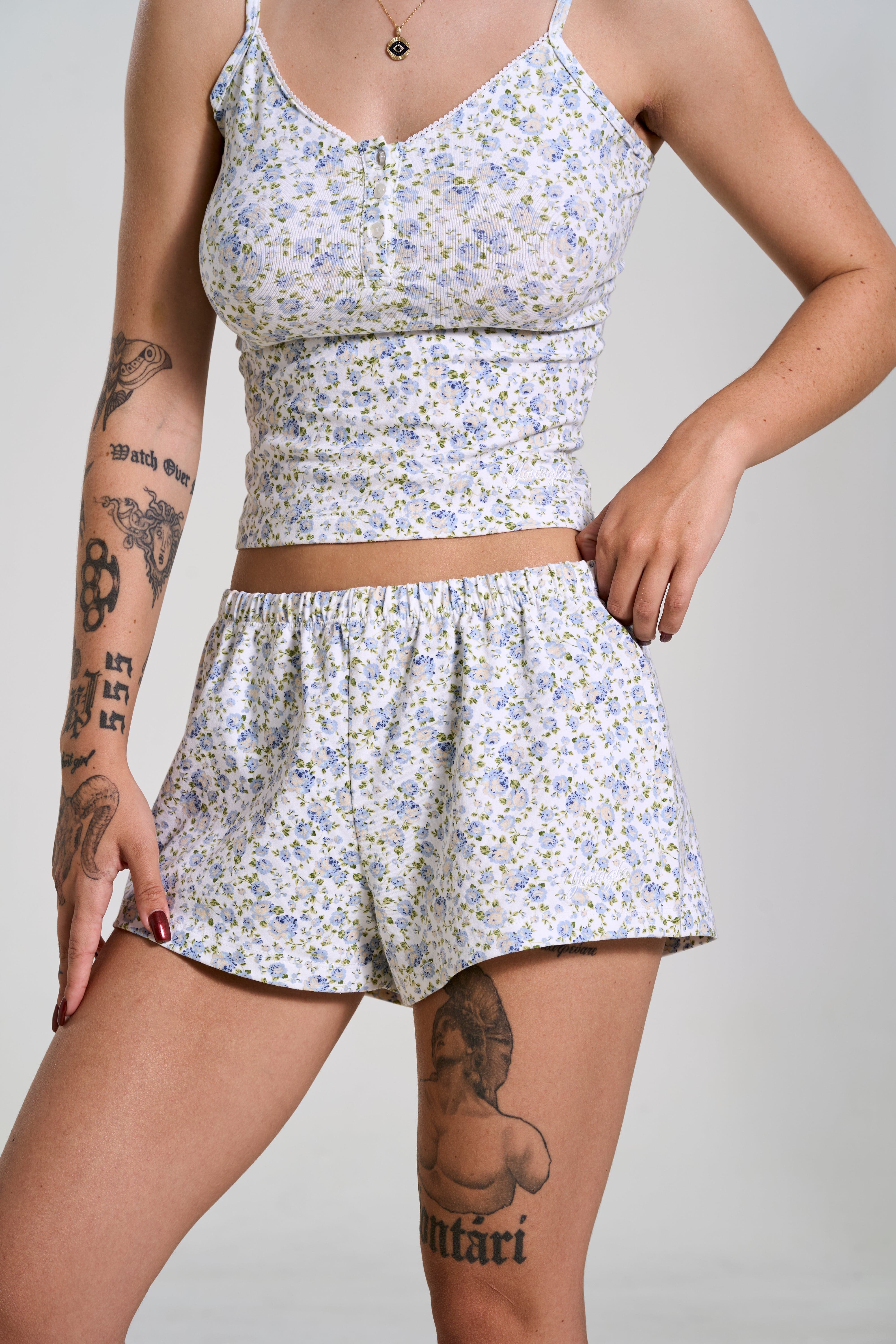 Side view of mens sleep shorts, highlighting the comfortable fit and embroidered logo.