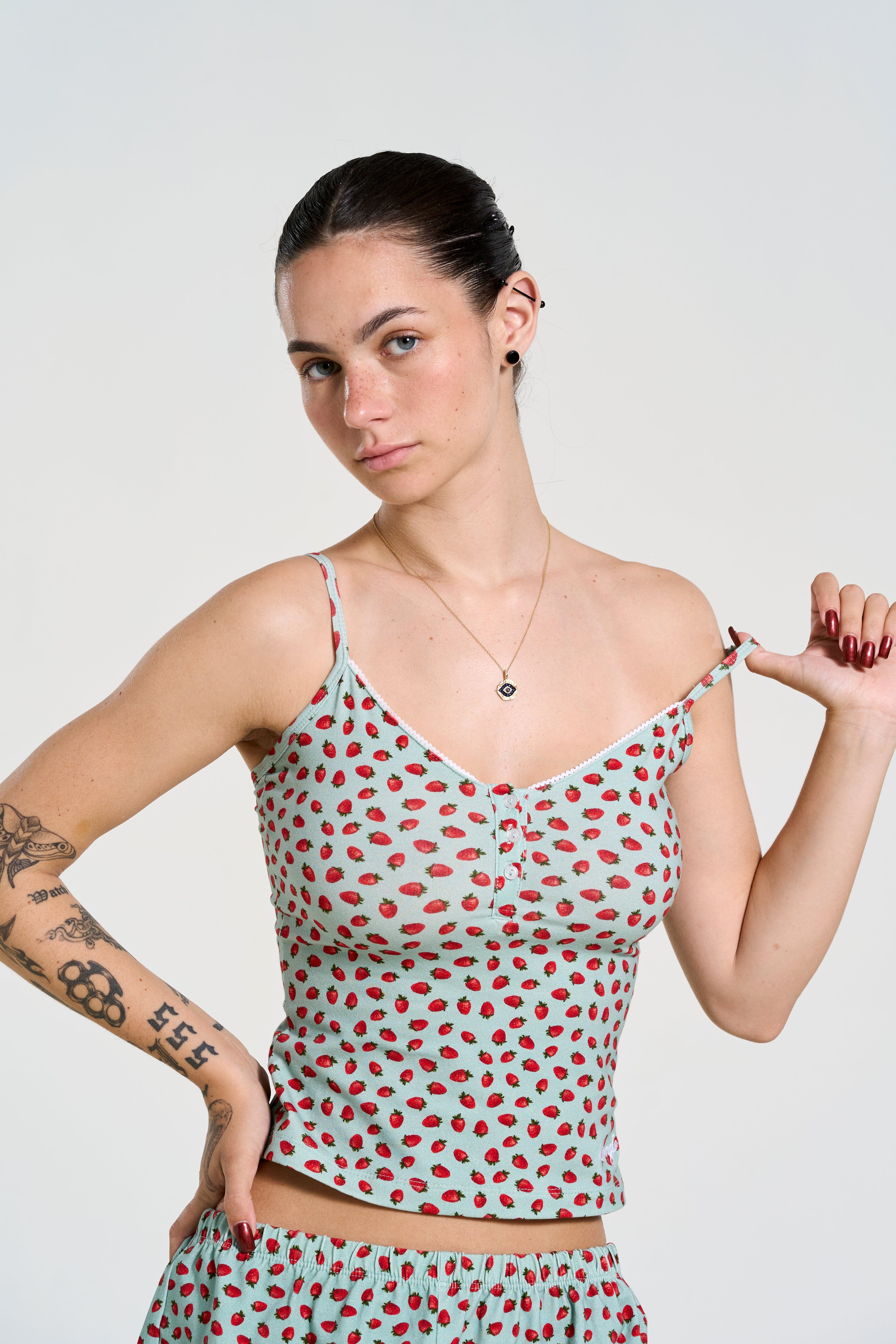 Model wearing chic cotton pajamas, demonstrating a true-to-size fit.