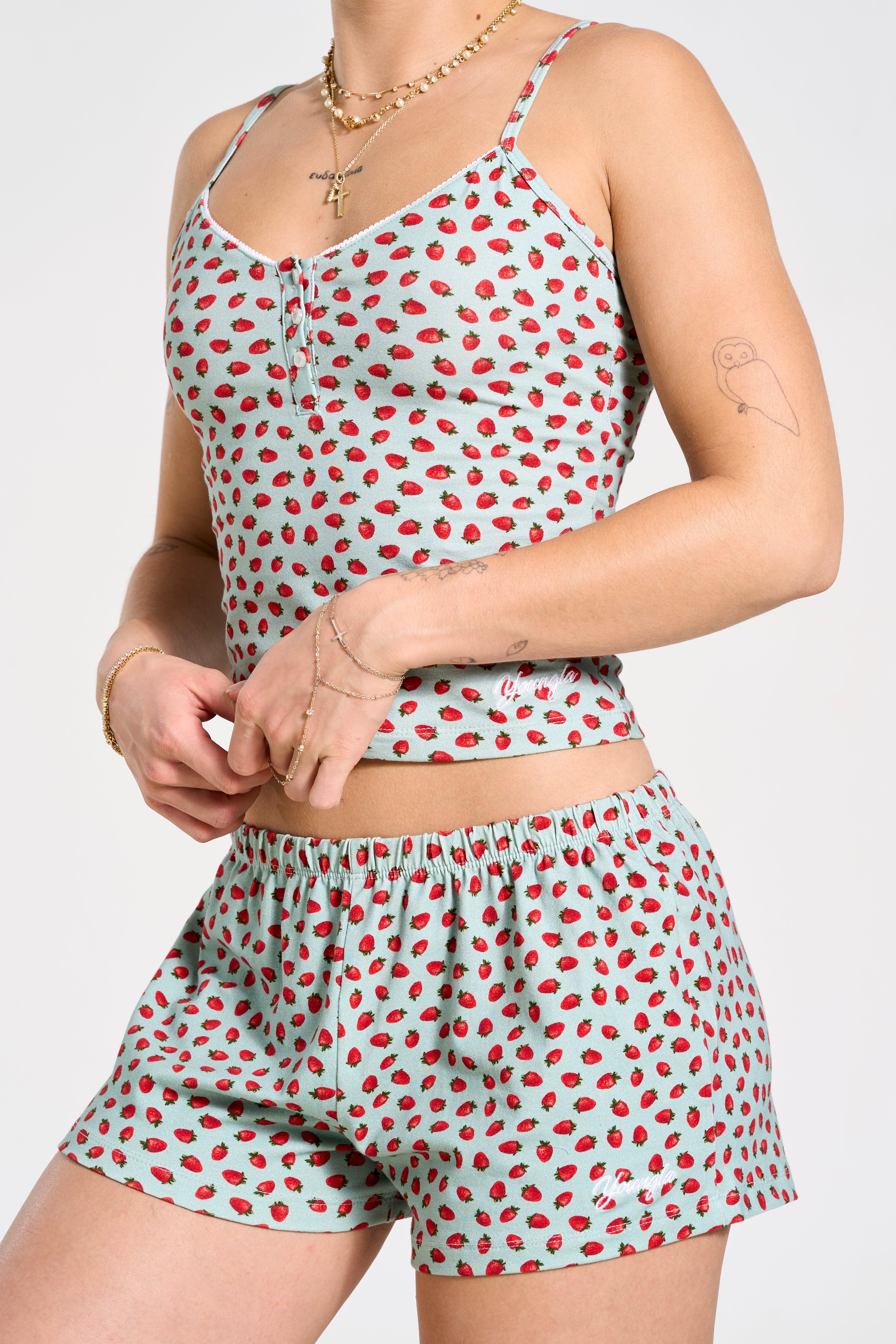 Side view of mens sleep shorts, highlighting the comfortable fit and embroidered logo.