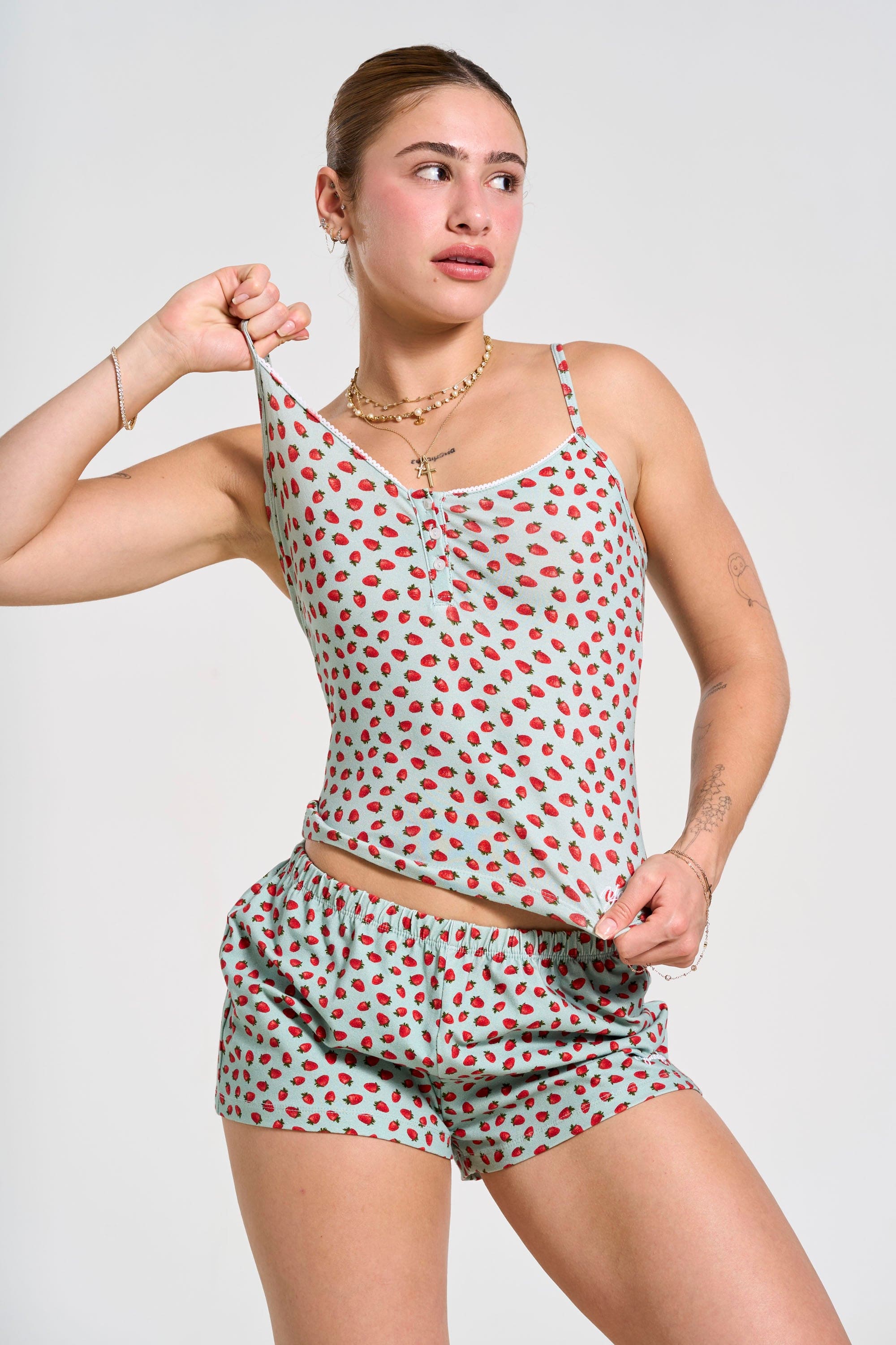 Close-up of lace neckline on cotton PJ top, showcasing elegant design.