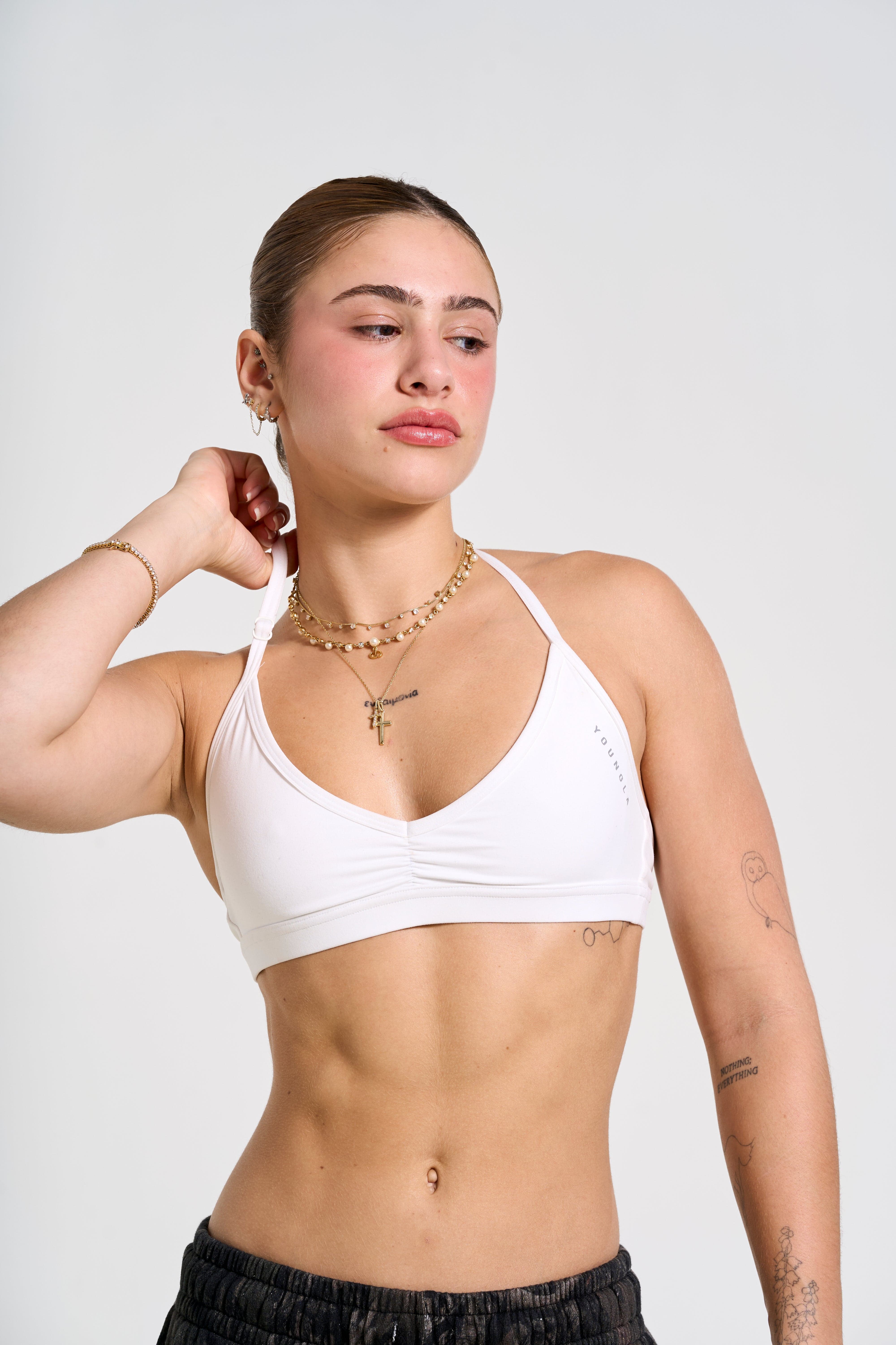 Flat lay of the bra showing scrunch detail and fabric texture