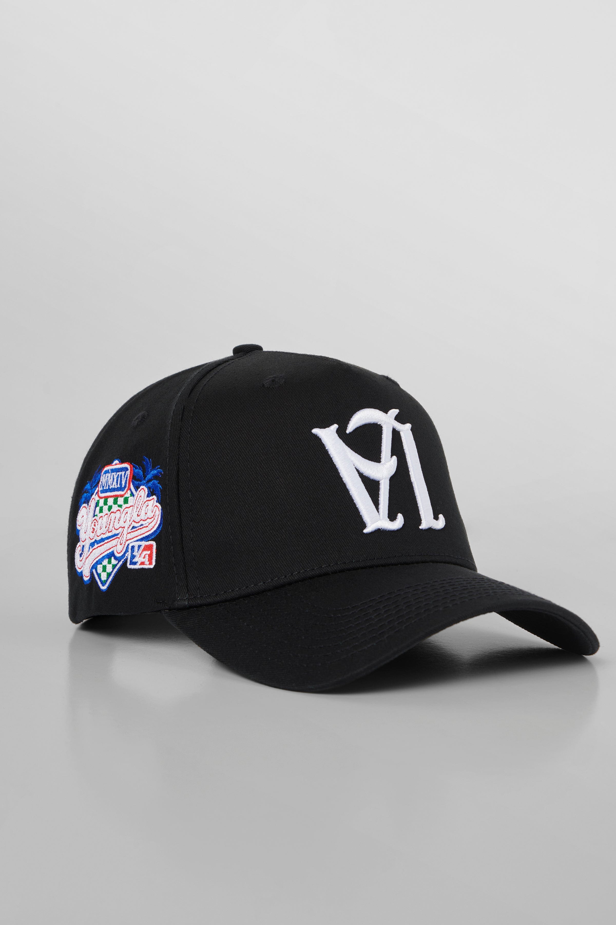 Front view of LA Reversed snapback hat showcasing premium embroidery.