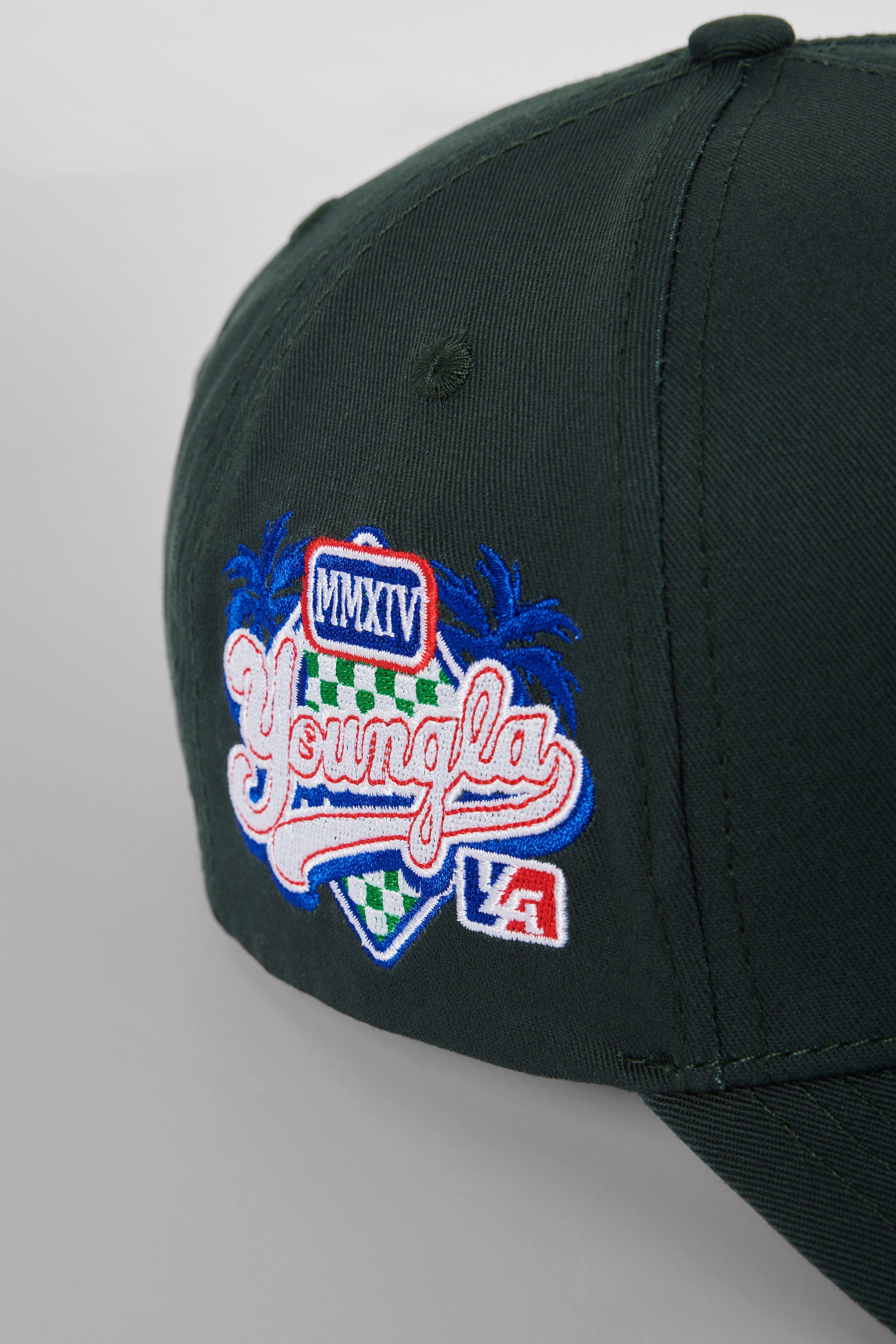 Side angle of the LA Reversed snapback hat, highlighting its A-frame design.