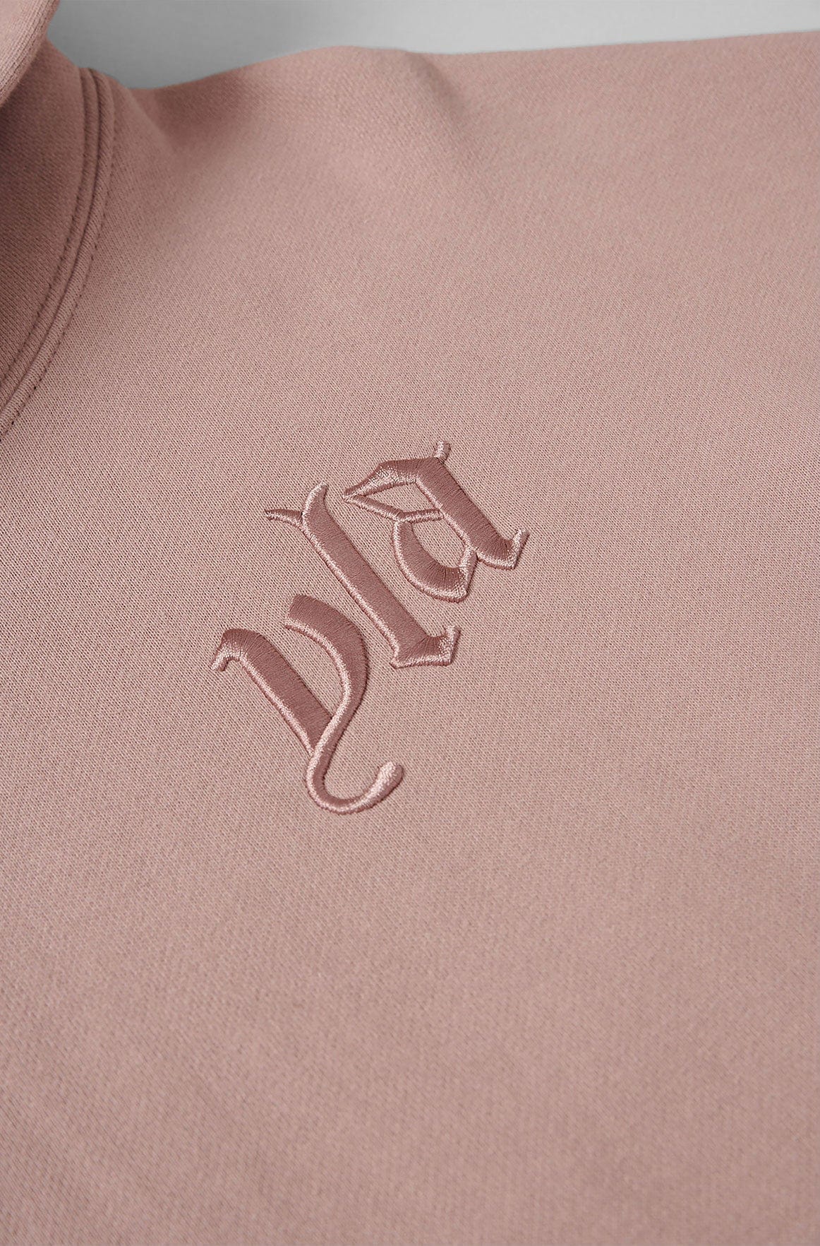 Close-up of fleece hoodie fabric texture on hanger