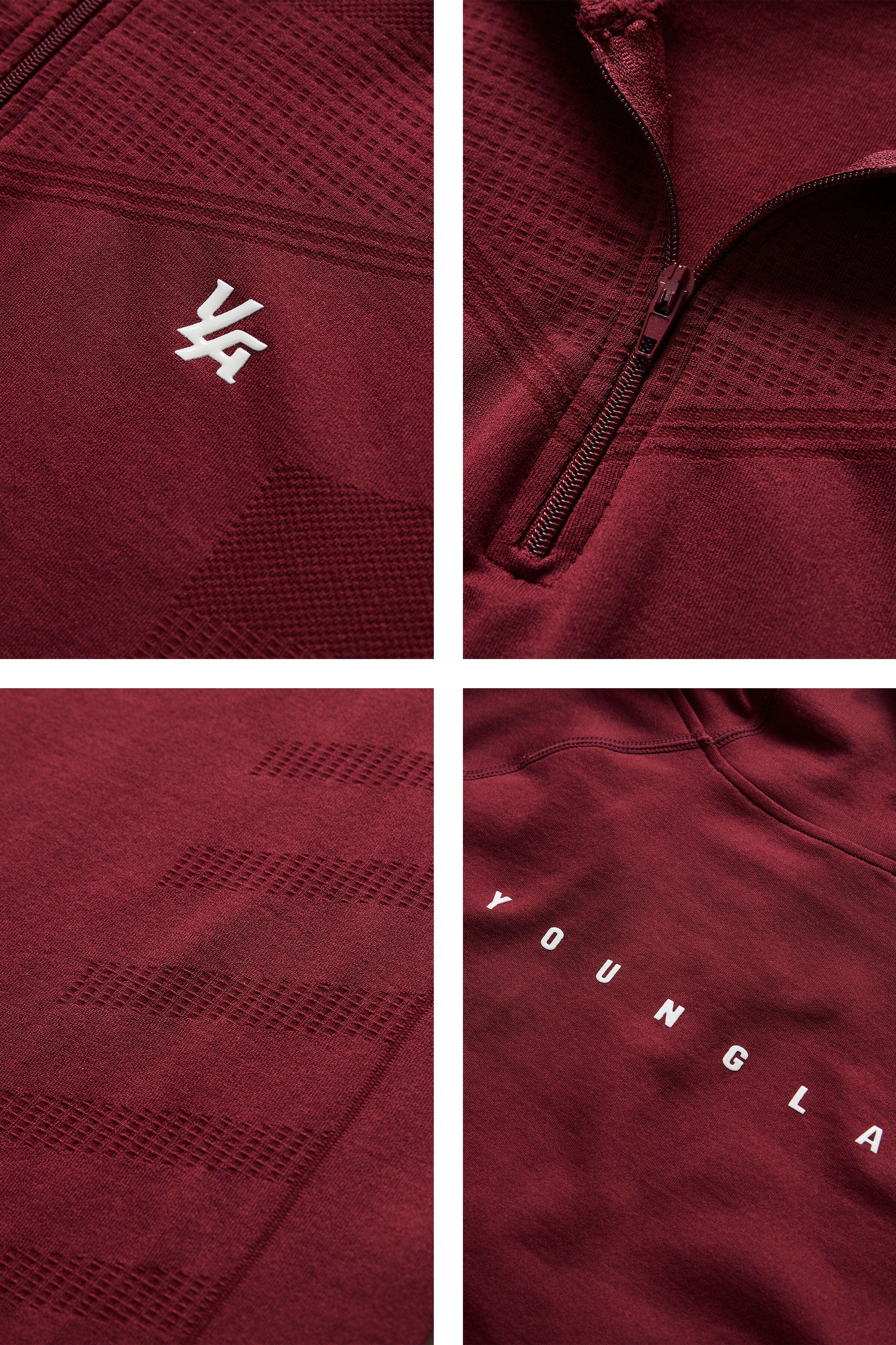 Back profile of no sleeve hoodie workout style showing design contours and brand detailing.