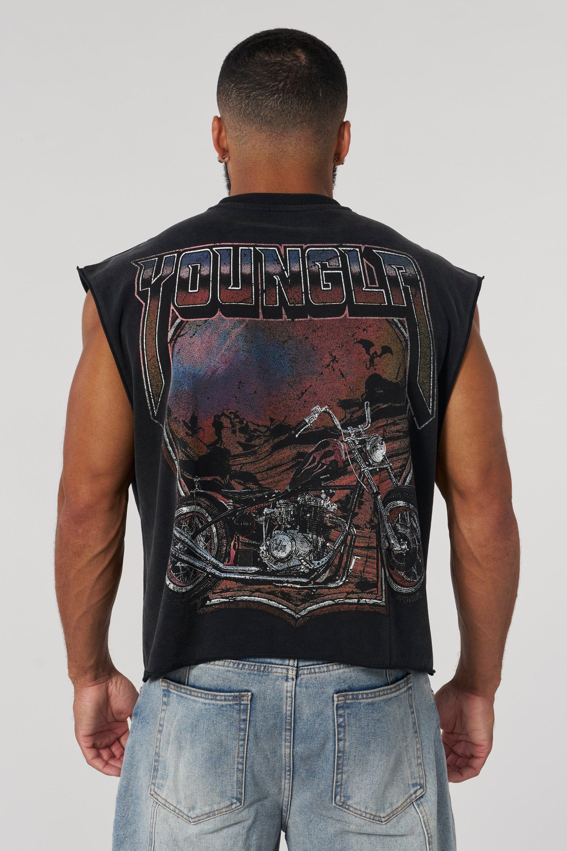 Close-up of distressed graphic on retro biker tank top