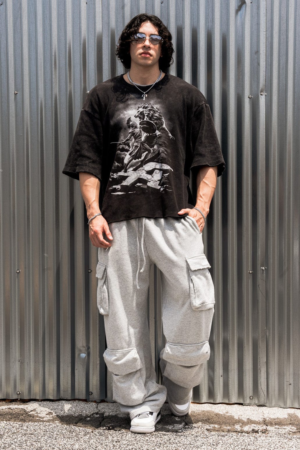 Front view of oversized tee showing gladiator-lion graphic