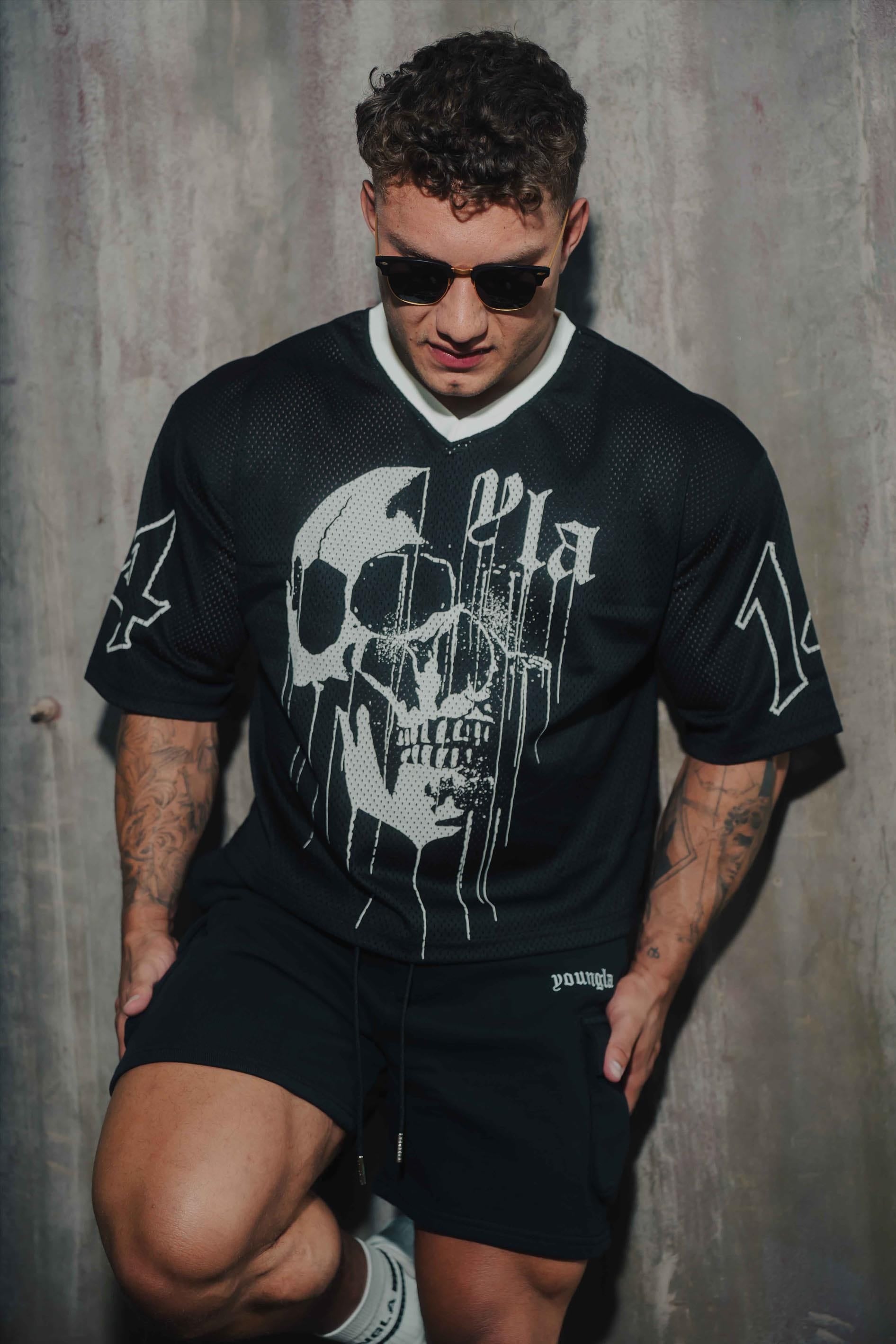 Front view of the drippy skull jersey showcasing bold design and relaxed fit