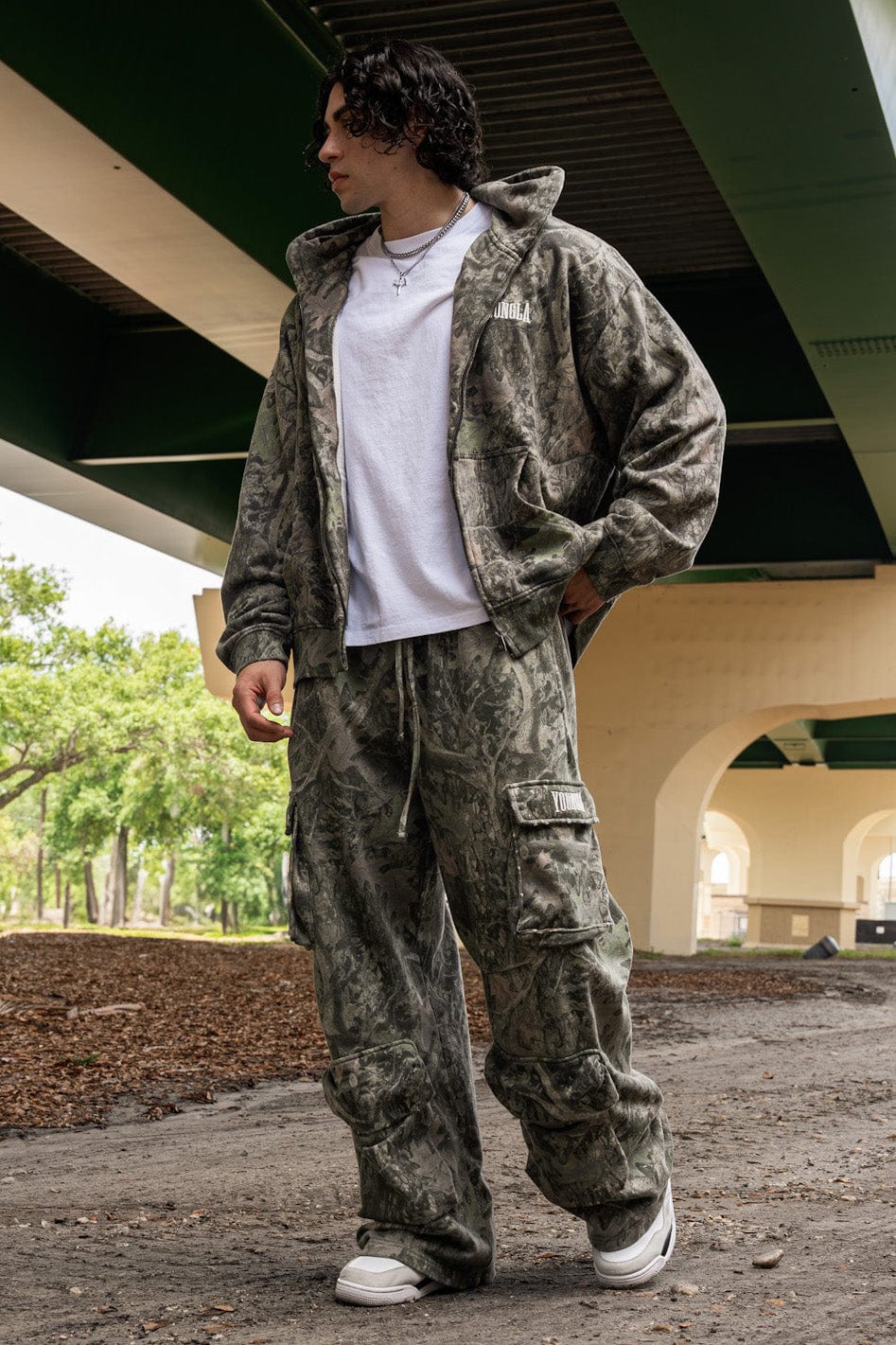 Front view of Heritage Cargo Sweatpants showcasing baggy fit and pockets.