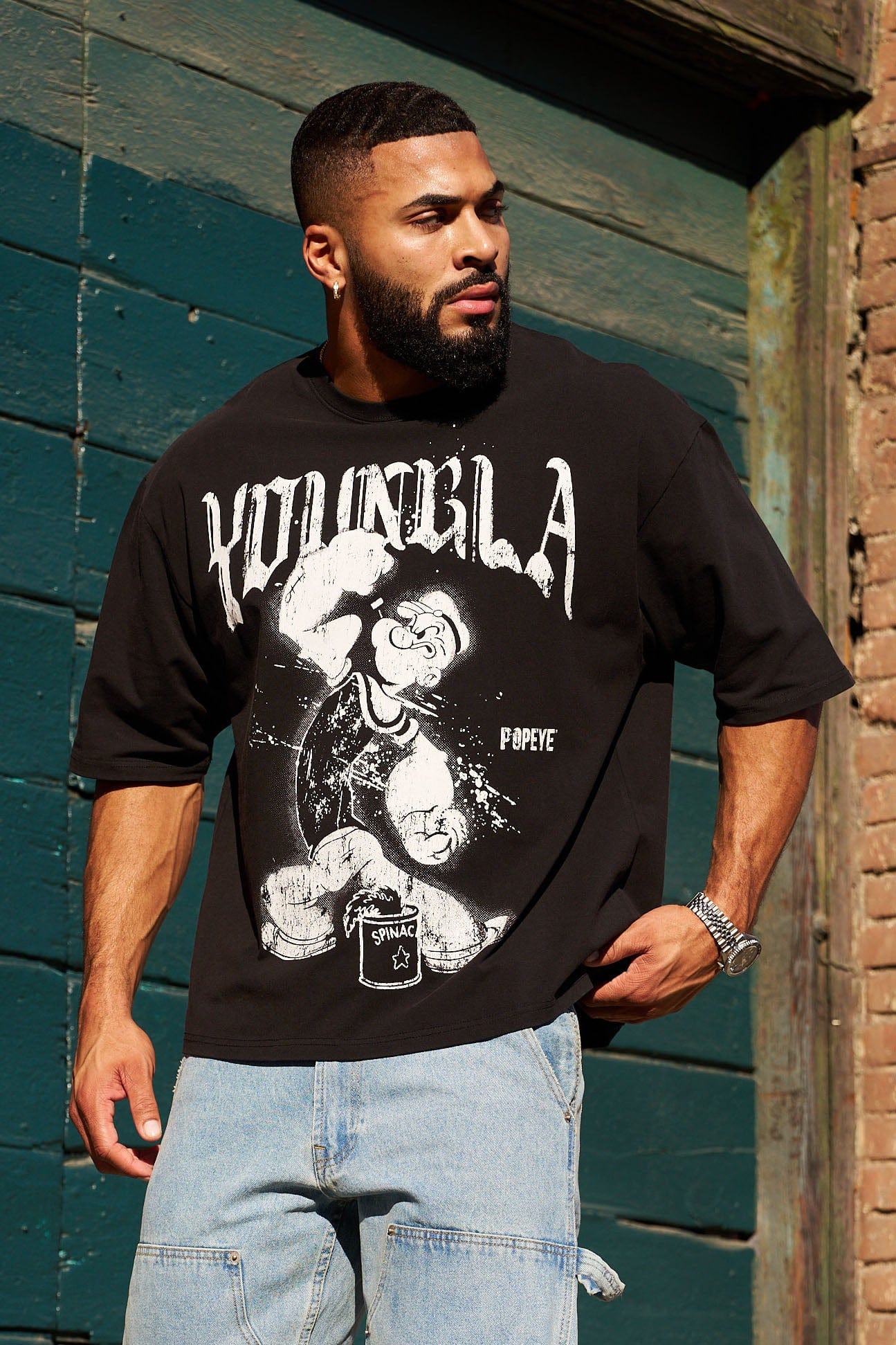 Front view of Popeye graphic T-shirt for men in streetwear style