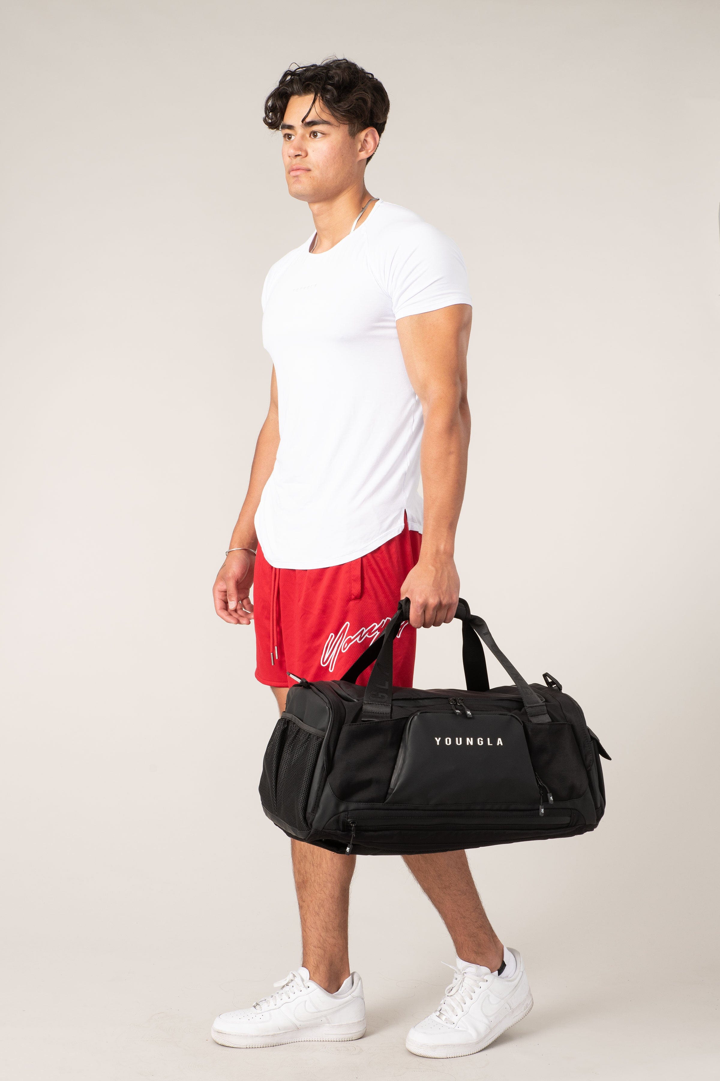 Front view of the versatile travel duffle backpack showcasing its spacious main compartment.