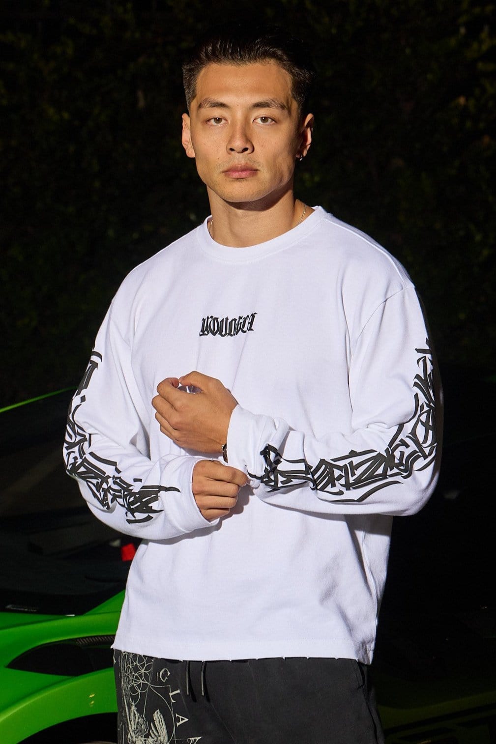 Model wearing Aura Vintage Long Sleeve T-Shirt in a casual setting.